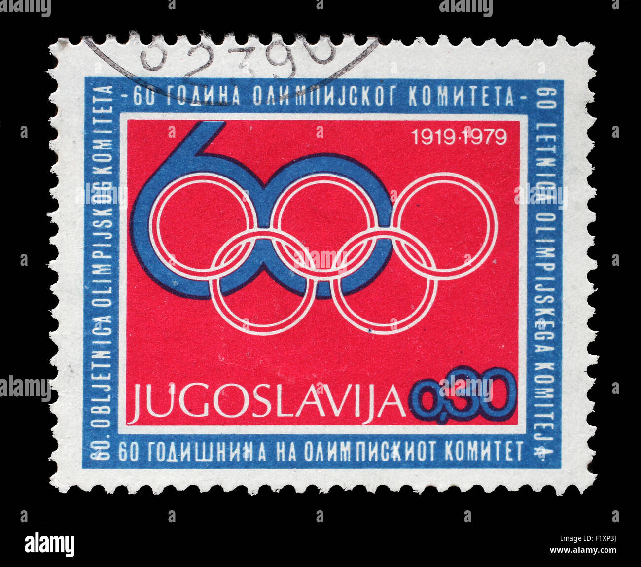 Timbro stampato dalla Iugoslavia è dedicato al sessantesimo anniversario del Comitato olimpico, circa 1979 Foto Stock
