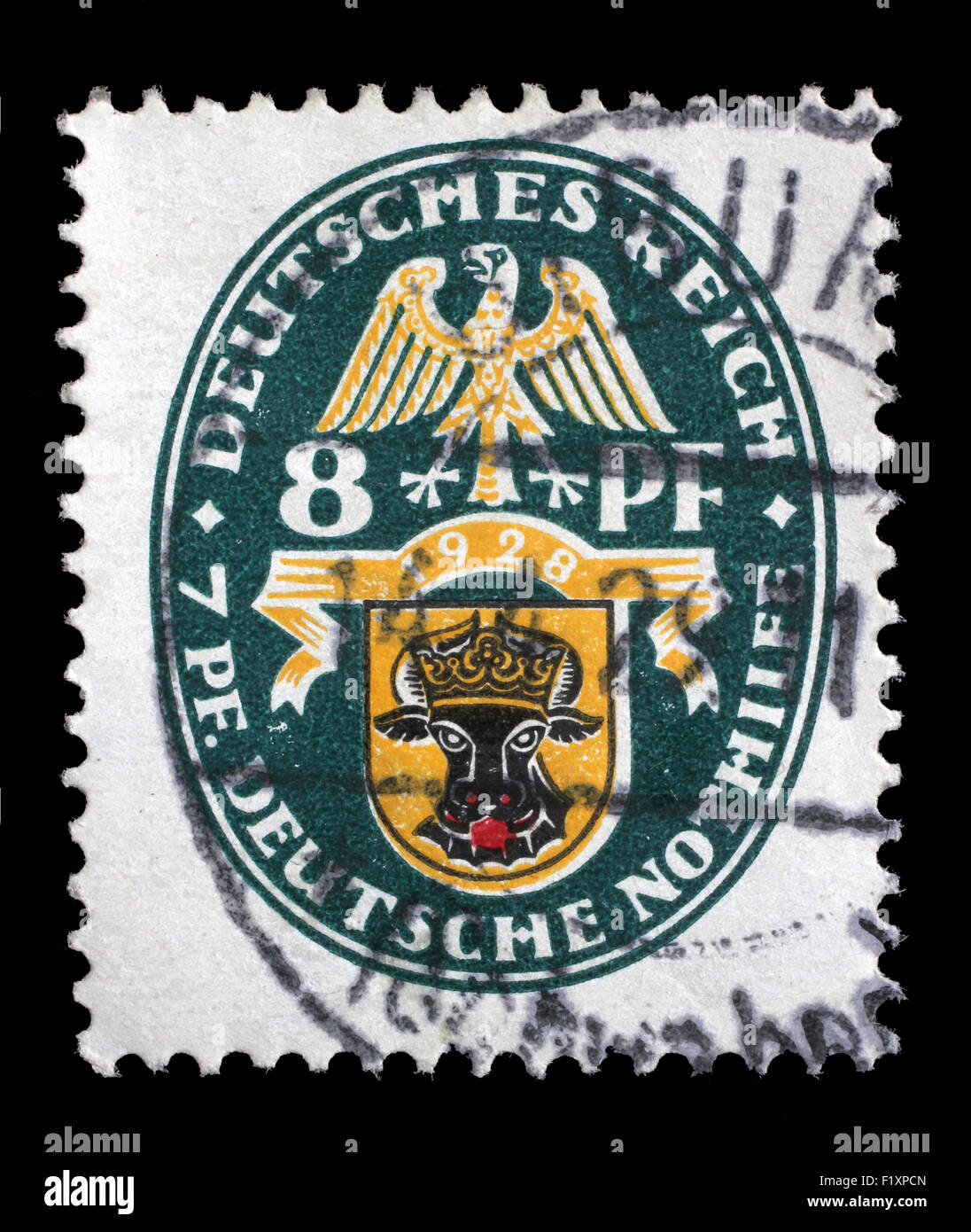 Timbro stampato nel Reich tedesco mostra lo stemma di carità, timbri, circa 1928. Foto Stock