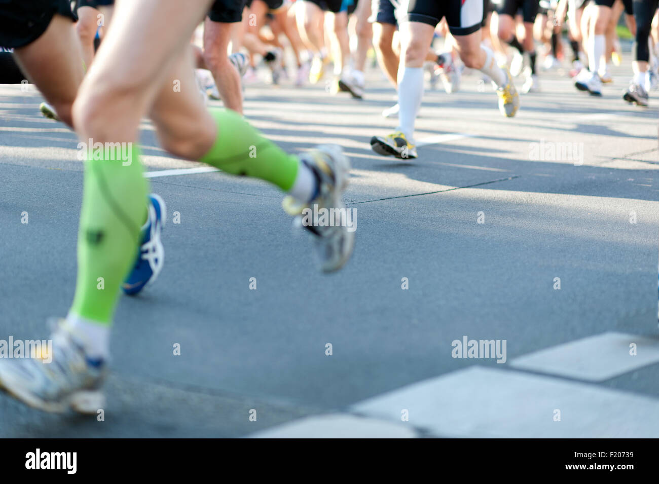 Beine von Marathonläufern Foto Stock