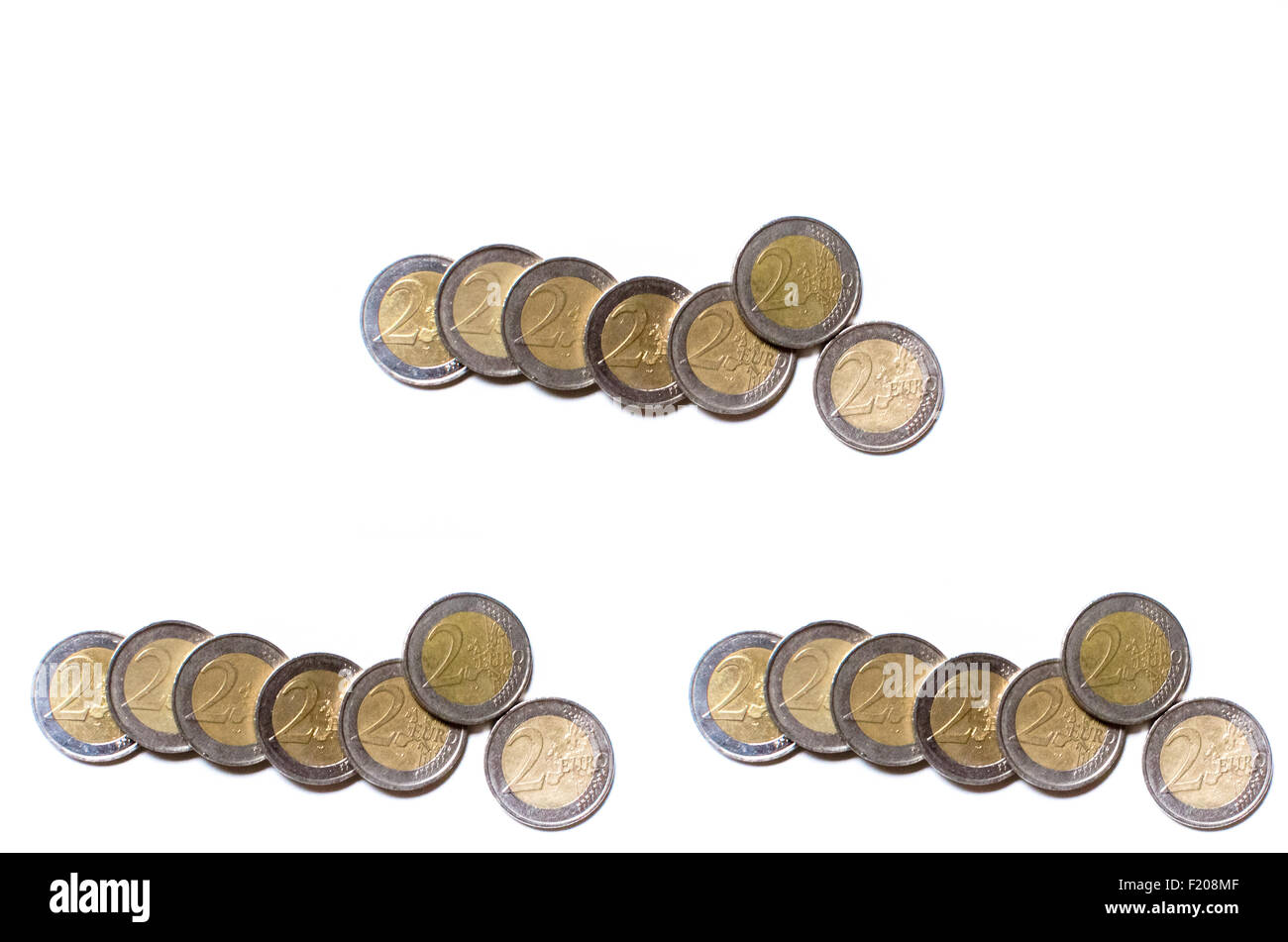 Monete di Europa risparmio di denaro isolato su uno sfondo bianco Foto Stock