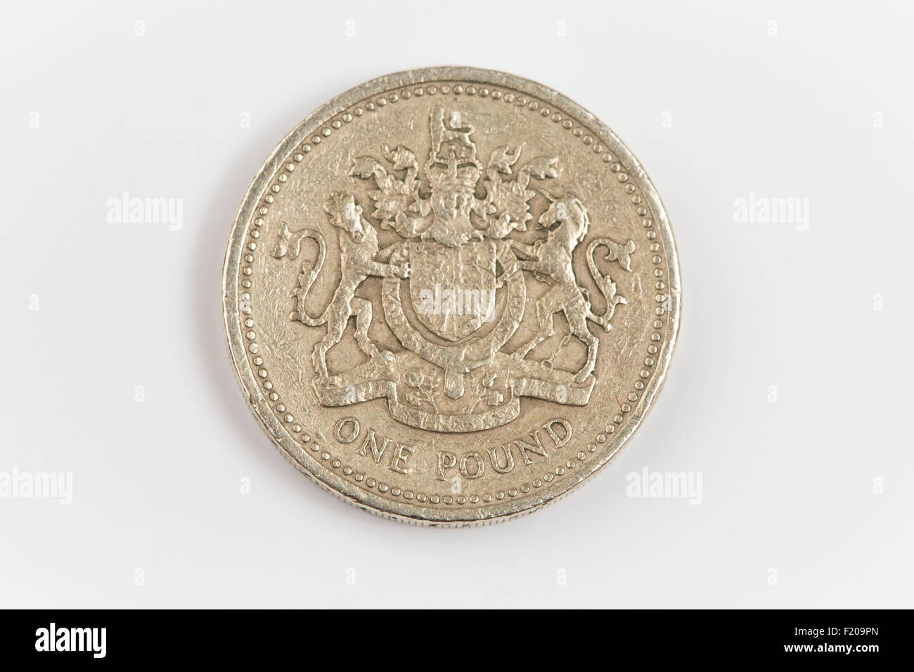 Una libbra di monete in valuta inglese Foto Stock