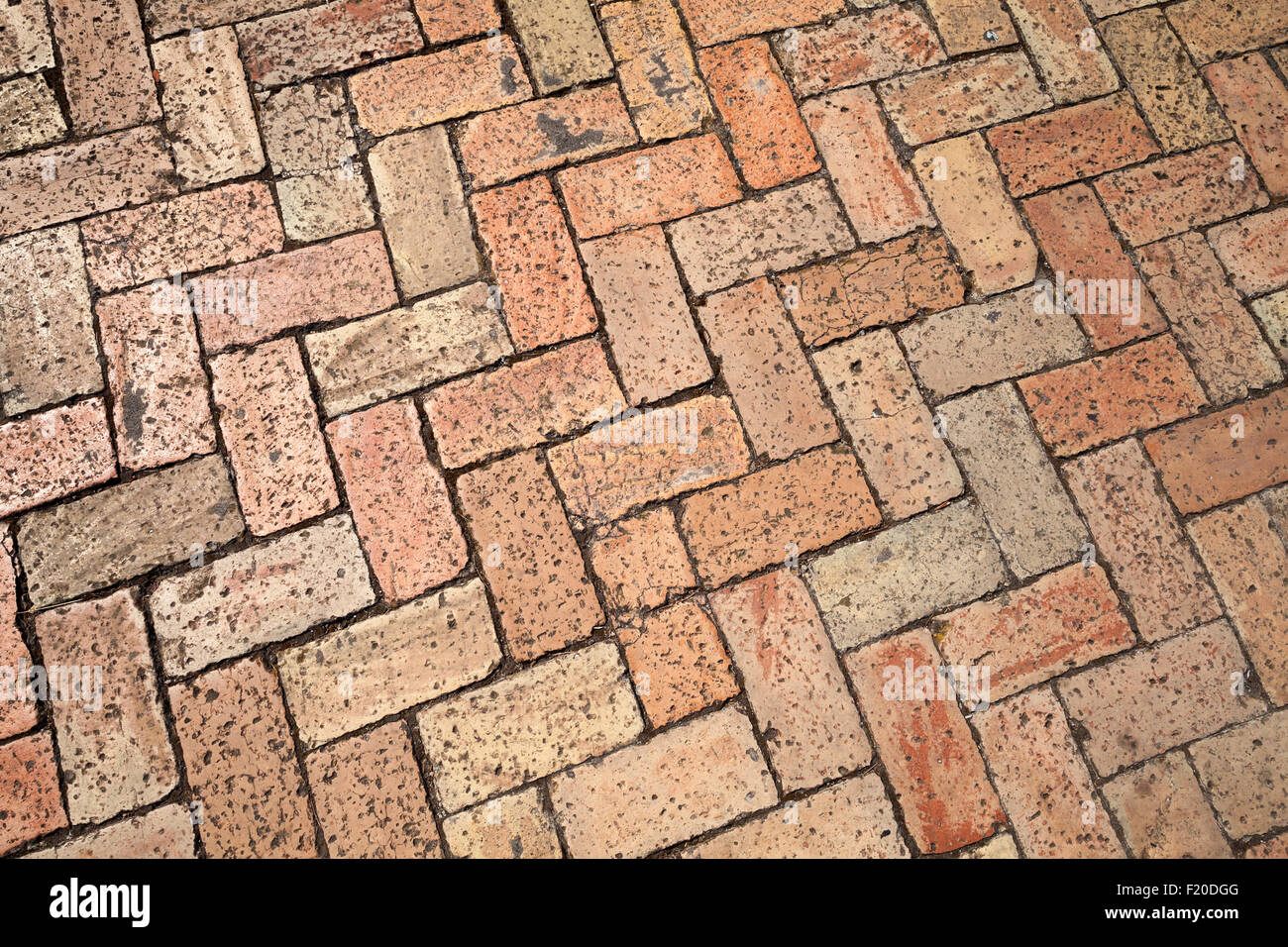 Vecchio rosso cobblestone pavement, foto di sfondo texture Foto Stock