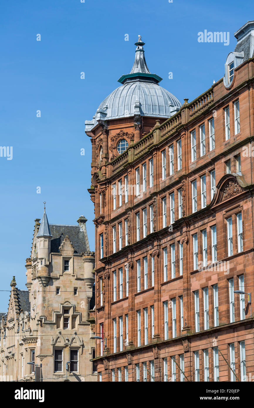 Arenaria rossa Tontine e arenaria bionda edifici Fraser Suites nella Merchant City, Trongate, Glasgow centro città, Scozia, Regno Unito Foto Stock