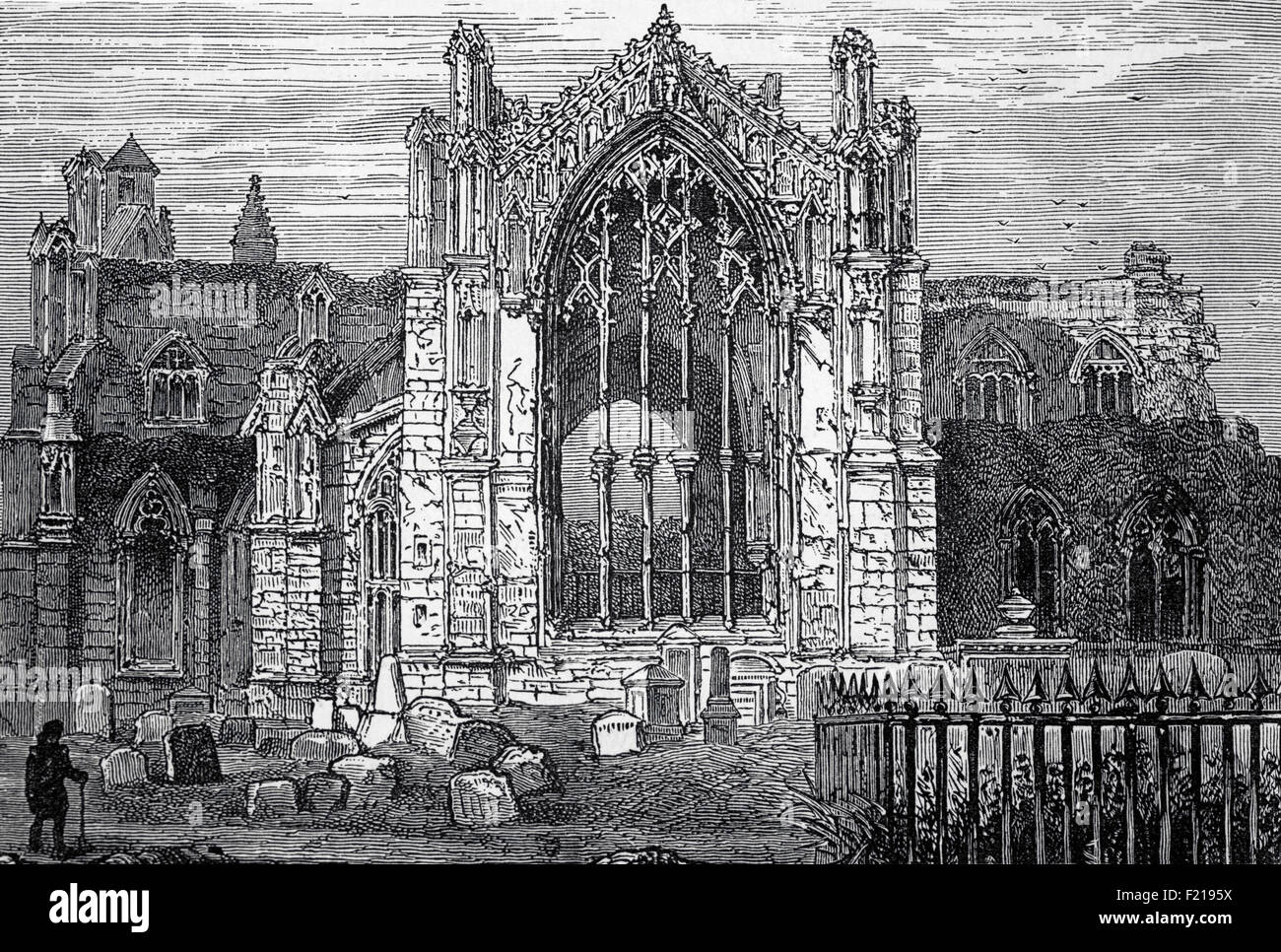 Abbazia di Santa Maria, Melrose è un monastero in parte rovinato dell'ordine cistercense a Melrose, Roxburghshire, ai confini scozzesi. Fu fondata nel 1136 dai monaci cistercensi su richiesta del re Davide i di Scozia e fu la casa principale di quell'Ordine nel paese fino alla riforma. Nel 1544, mentre gli eserciti inglesi infuriavano in tutta la Scozia, l'abbazia fu nuovamente gravemente danneggiata e non fu mai completamente riparata, portando al suo declino come monastero funzionante. Nel 1590 morì l'ultimo monaco di Melrose. L'abbazia fu successivamente bombardata dalle truppe di Oliver Cromwell durante la guerra civile inglese. Foto Stock