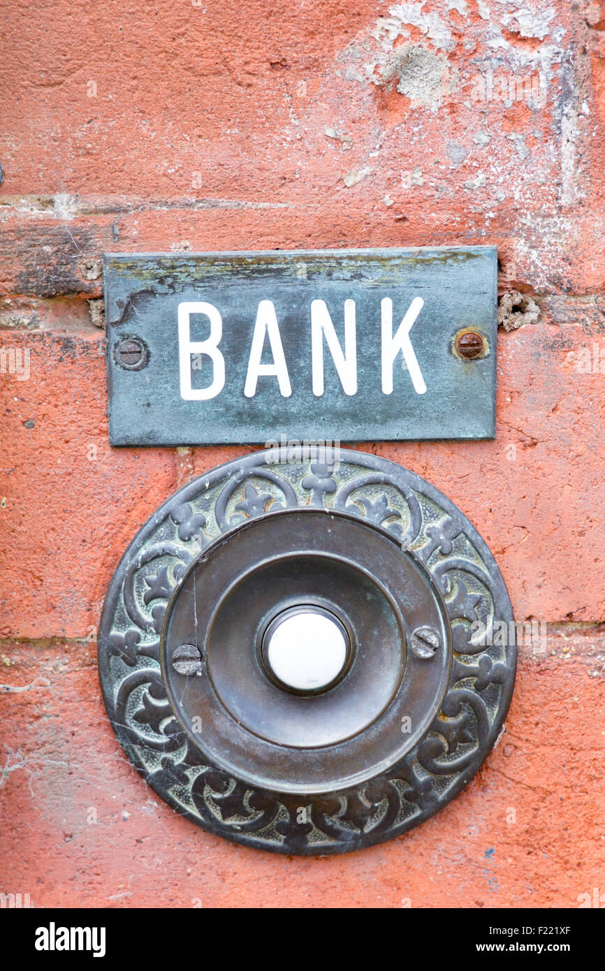 Banca campanello impostato nella parete di edificio Foto Stock