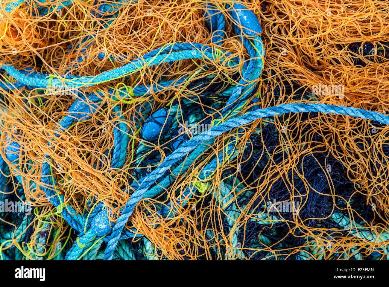 Orange reti da pesca in un'isola greca Foto Stock