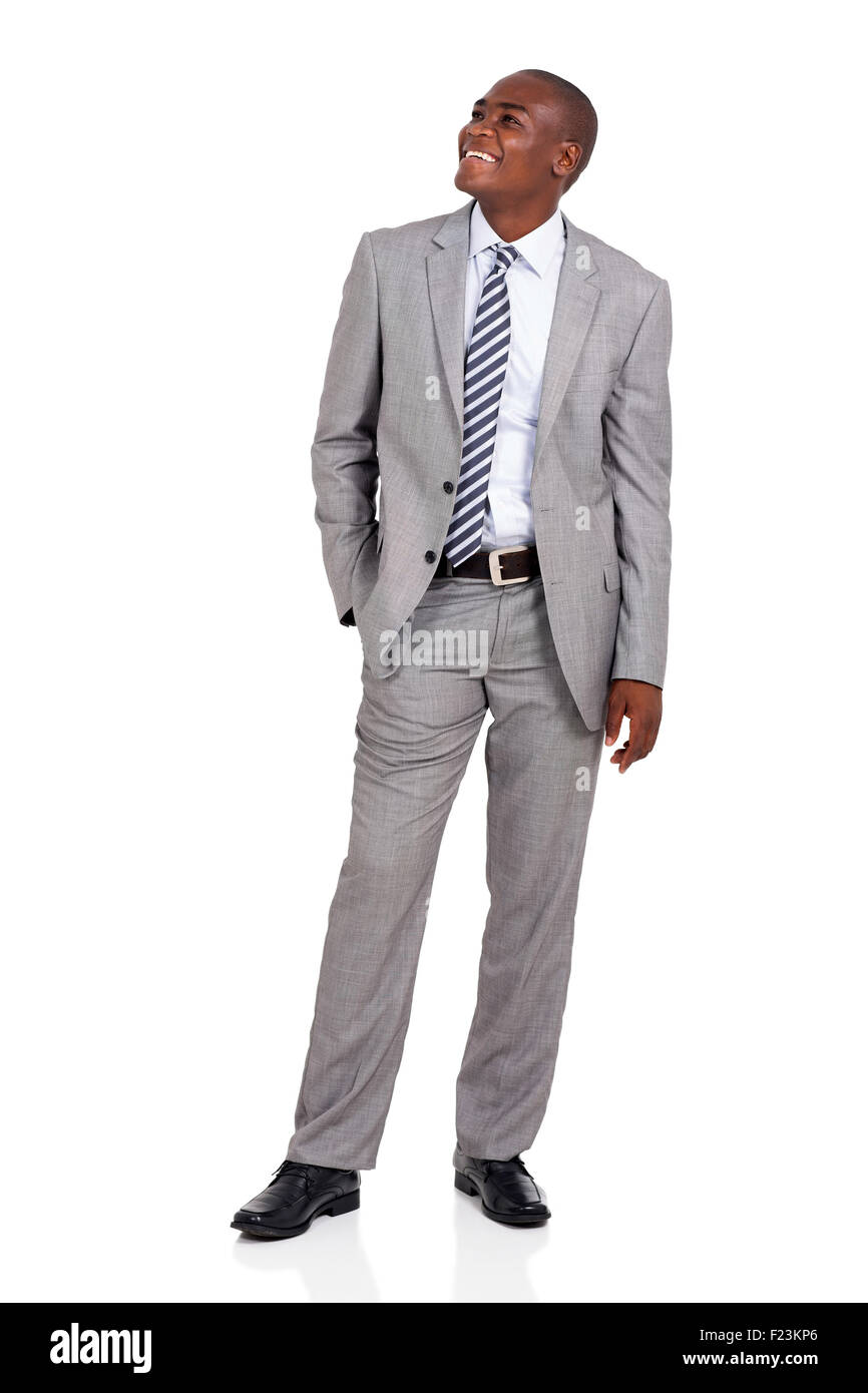 Allegro African American businessman cercando su sfondo bianco Foto Stock