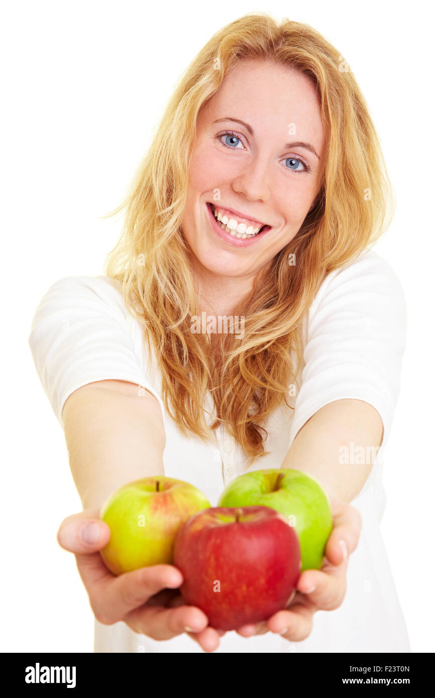 Donna Felice Tiene tre mele nelle sue mani Foto Stock