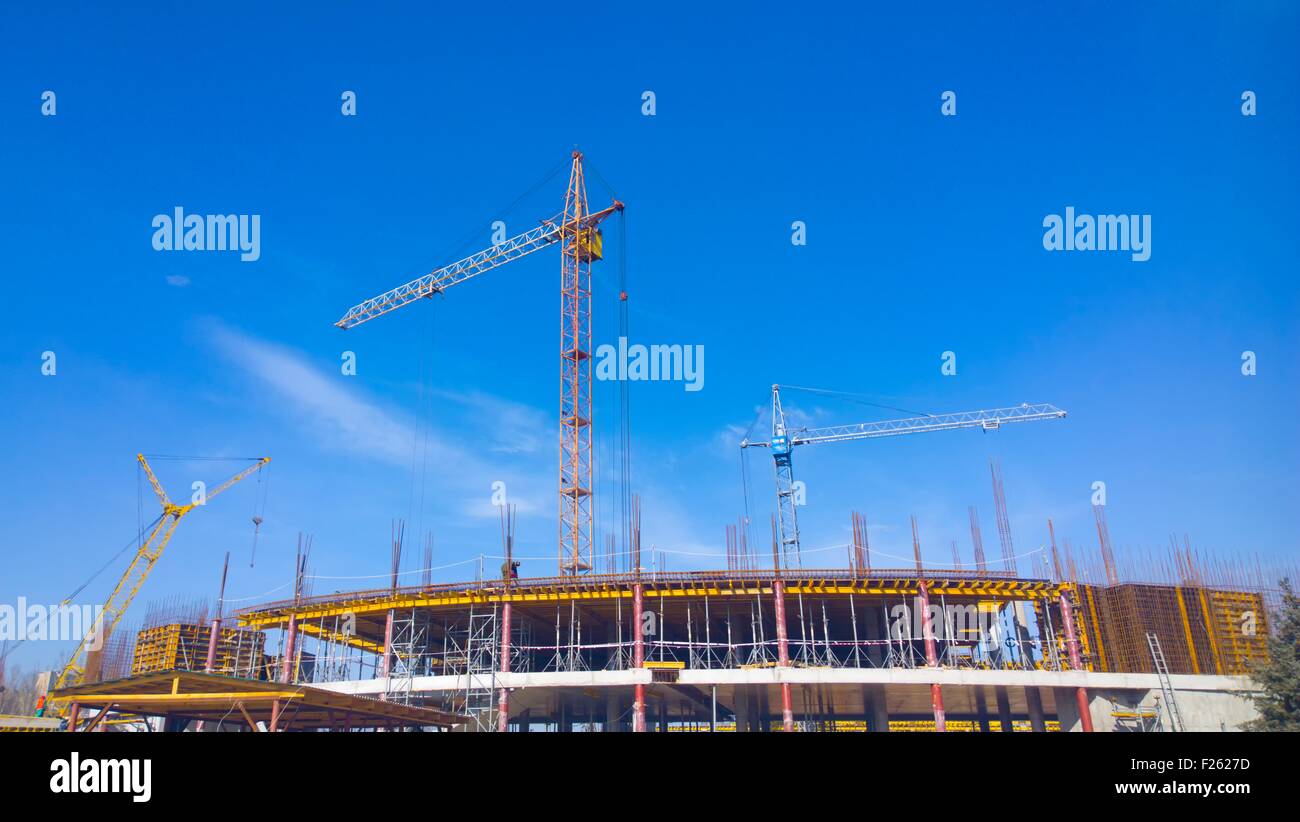 Costruzione di gru su sky costruisce stadium Foto Stock