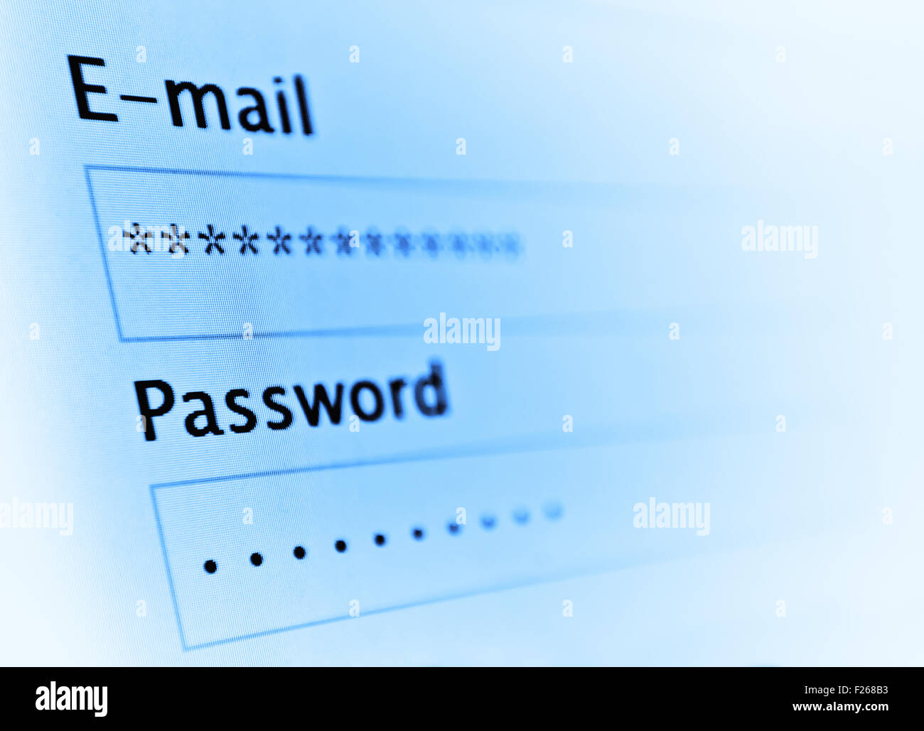 Login e password sulla schermata monitor. Tonica su blu Foto Stock