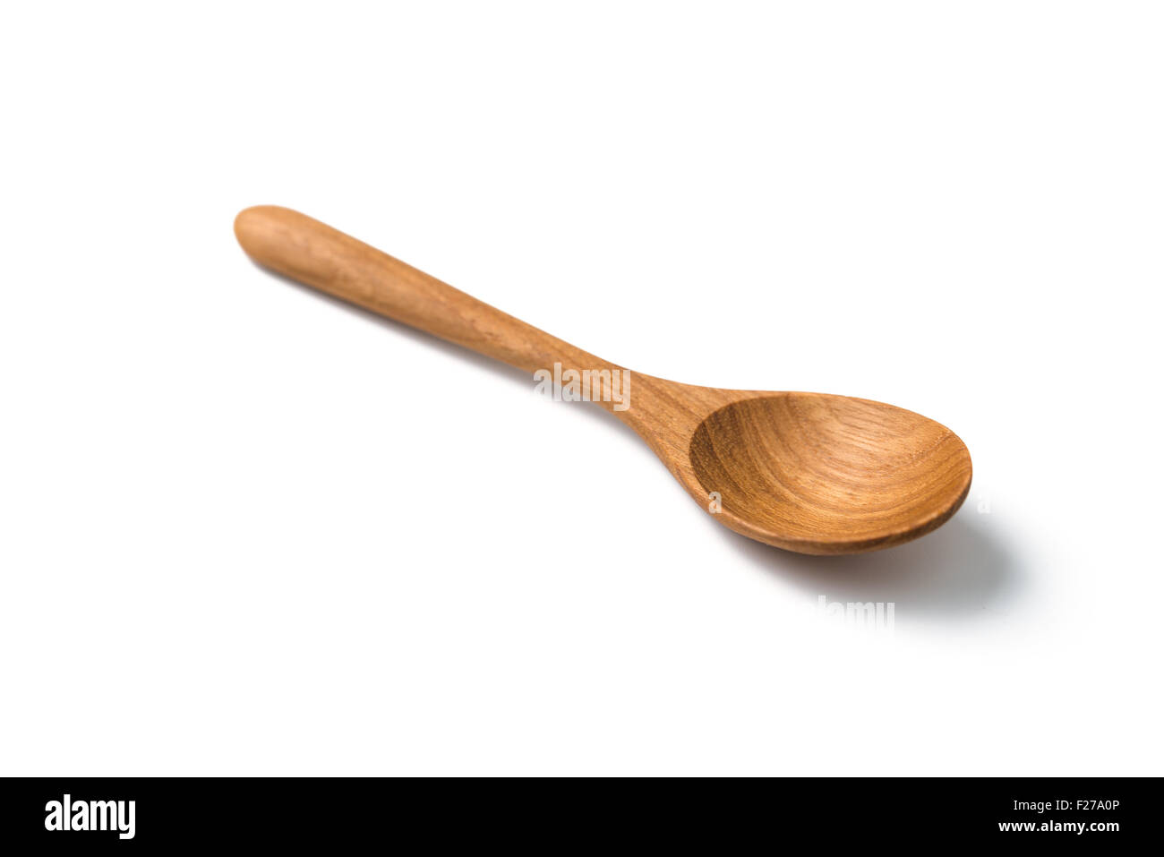 Cucchiaio di legno isolato su bianco Foto Stock