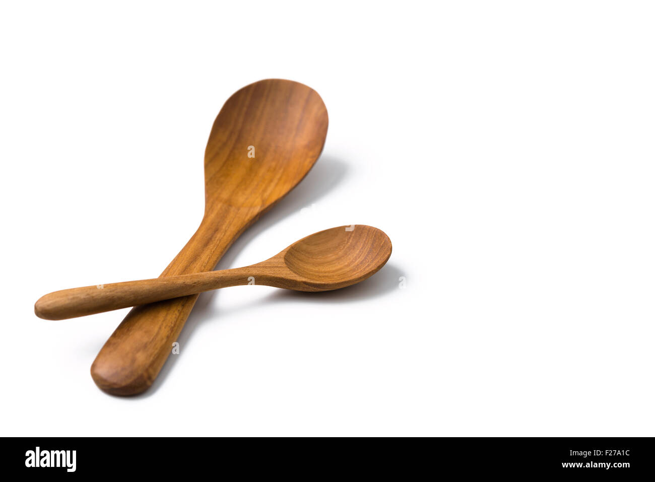 Cucchiaio di legno isolato su bianco Foto Stock