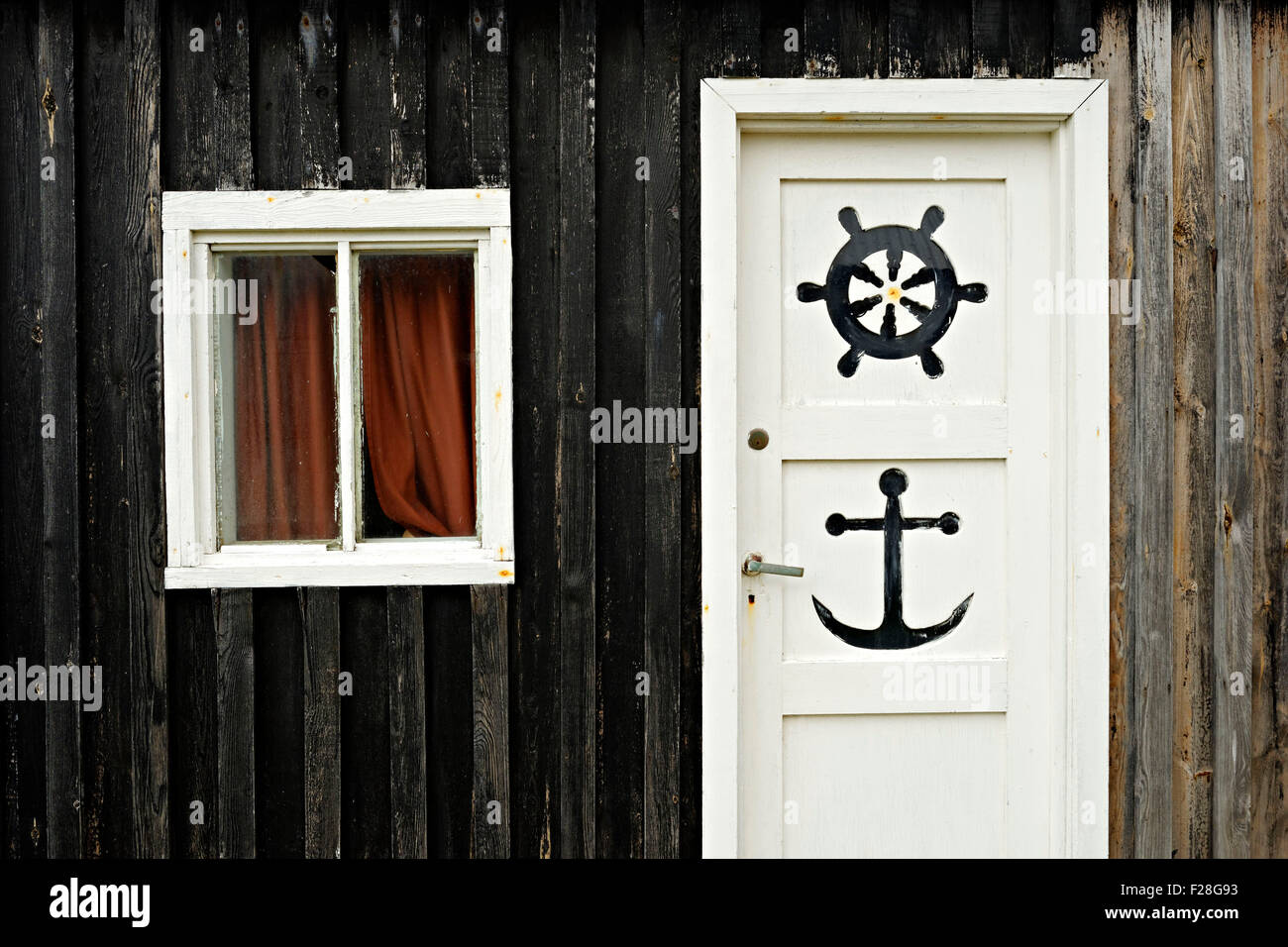 Capanna di marinai di porta e finestra, Flatey Isola, Islanda, l'Europa. Foto Stock