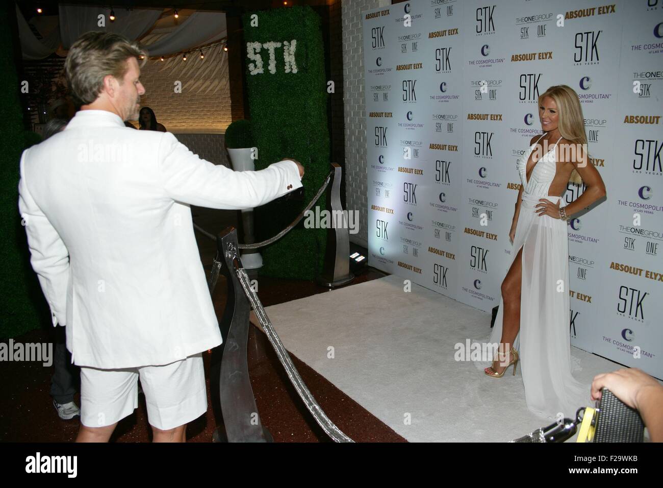 Las Vegas, NV, Stati Uniti d'America. Xiv Sep, 2015. Slade Smiley, Gretchen Rossi presso gli arrivi per STK Las Vegas getta 3° End-Of annuale-Estate Abbigliamento bianco affare, il Cosmopolitan di Las Vegas, Las Vegas NV, Settembre 14, 2015. Credito: James Atoa/Everett raccolta/Alamy Live News Foto Stock