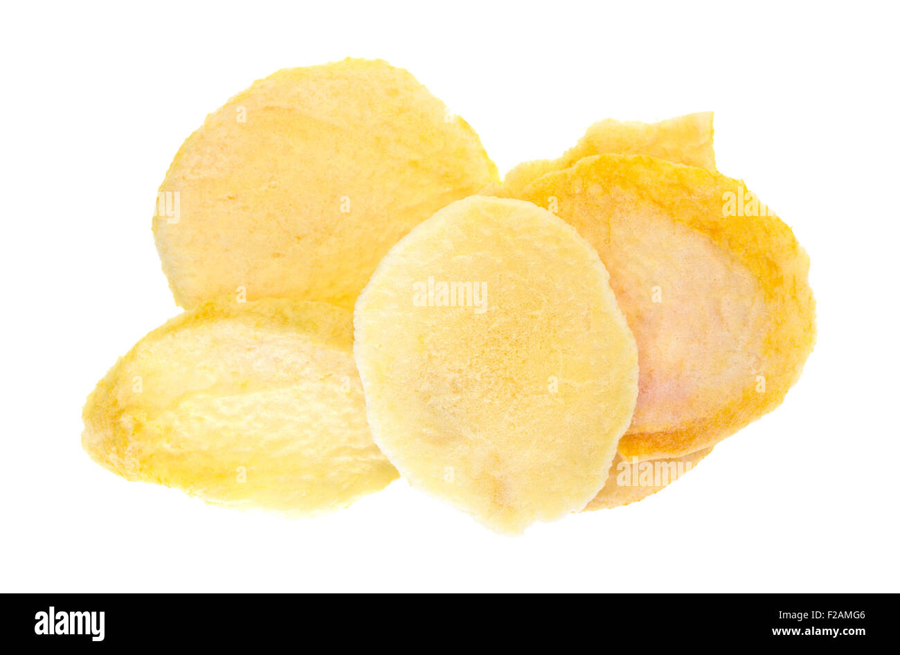 Vista dall'alto di una porzione di secche Pesche fette isolato su uno sfondo bianco. Foto Stock