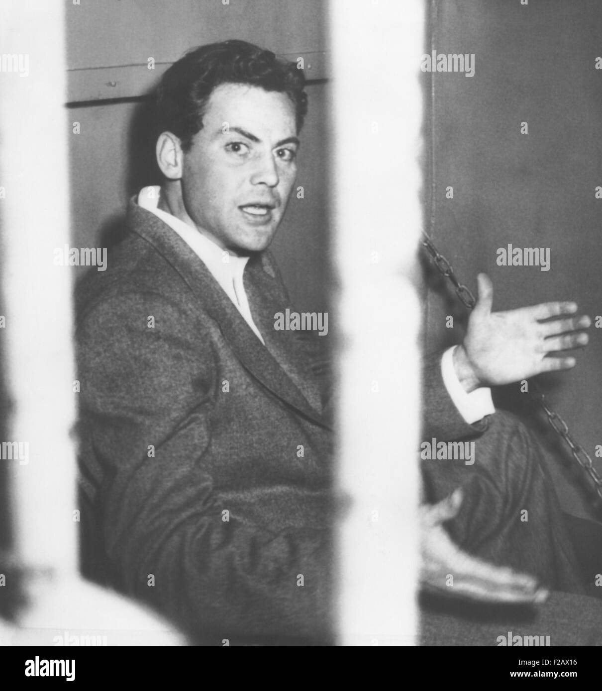 Attore John Agar, proteste fotografi prendendo la sua immagine dopo il suo azionamento ubriaco arresto. Febbraio 12, 1950. Il 29 enne attore Foto Stock