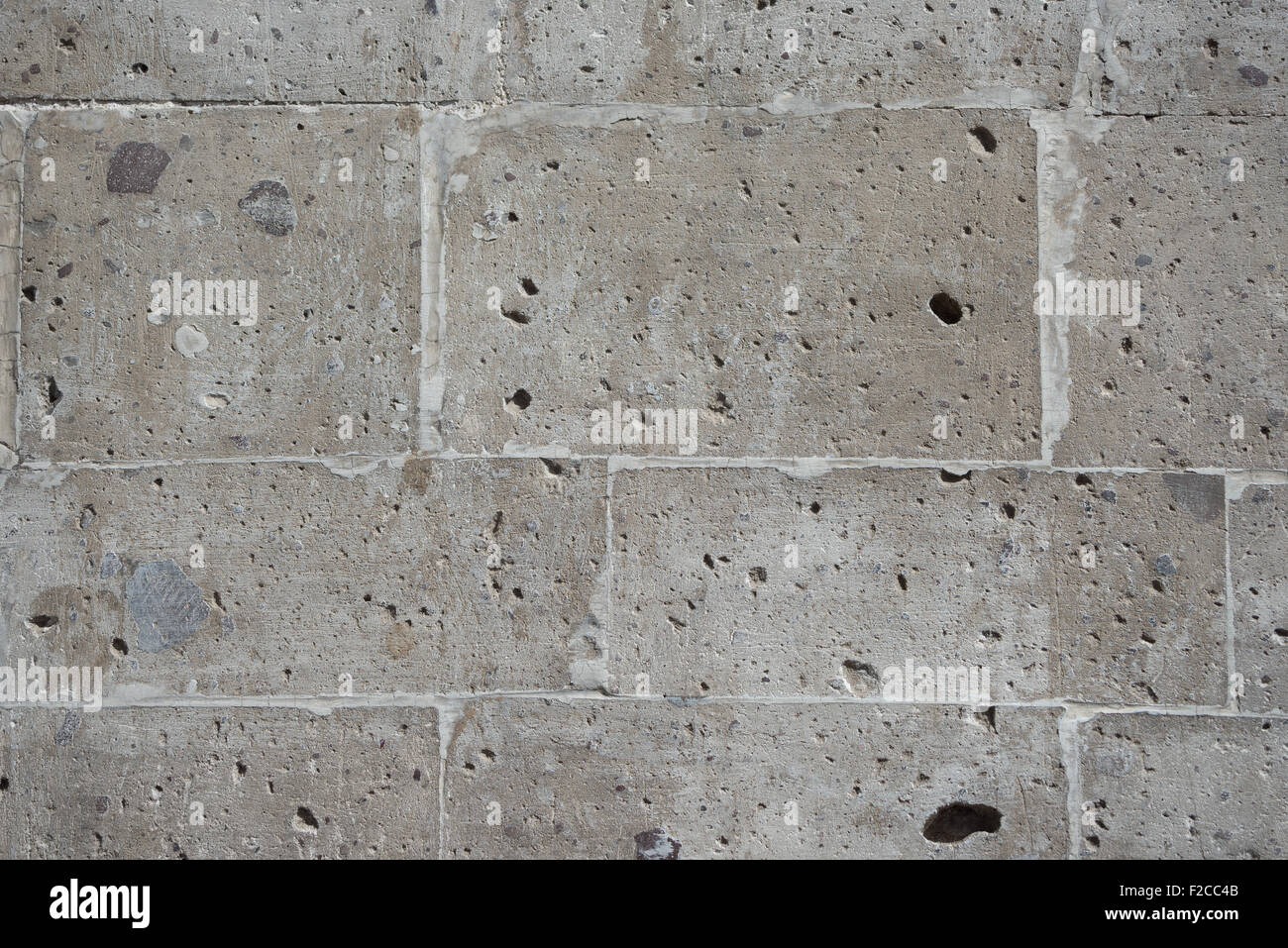 Naturale di pietra vulcanica parete, lucidato, patrimonio di storia coloniale di Arequipa, Perù, noto con il nome locale 'sillar'. Natur Foto Stock