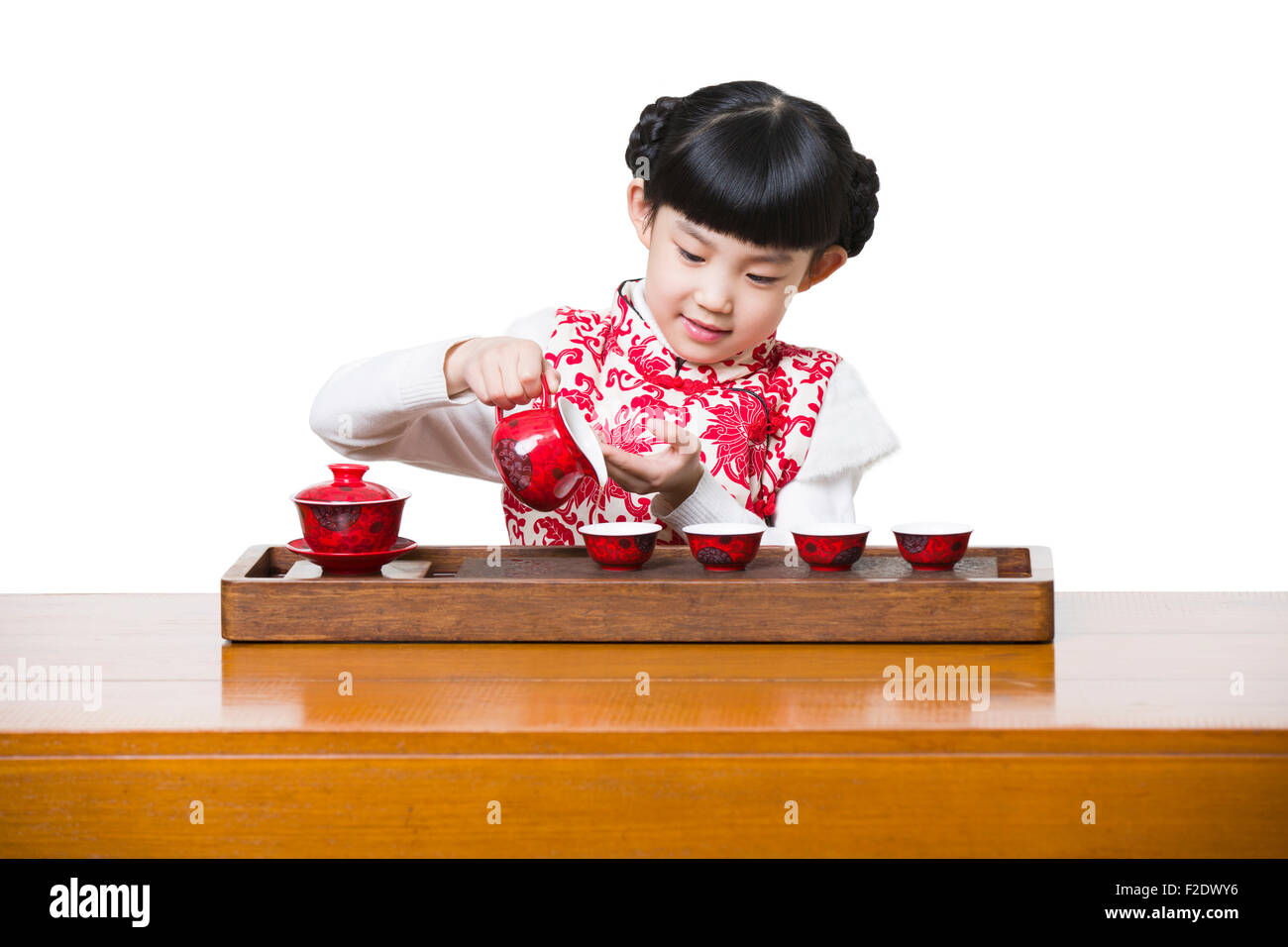 Felice ragazza di eseguire la cerimonia del tè Foto Stock