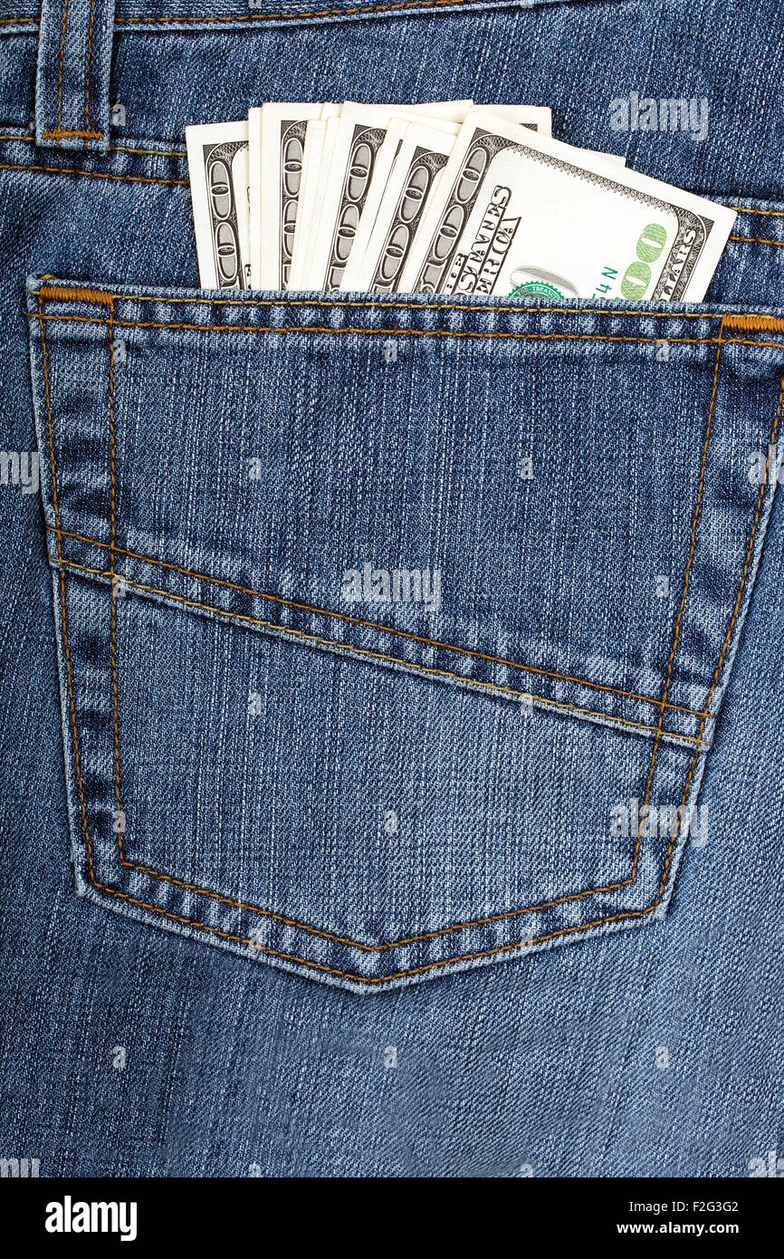 Jeans con il denaro americano Foto Stock