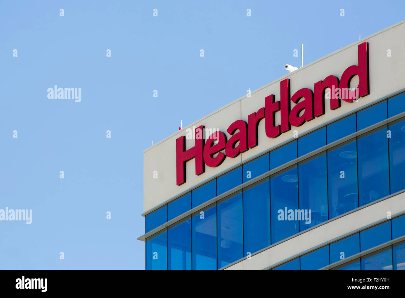 Un segno del logo al di fuori di una struttura occupata dal cuore dei sistemi di pagamento, Inc. di Plano, in Texas, il 12 settembre 2015. Foto Stock