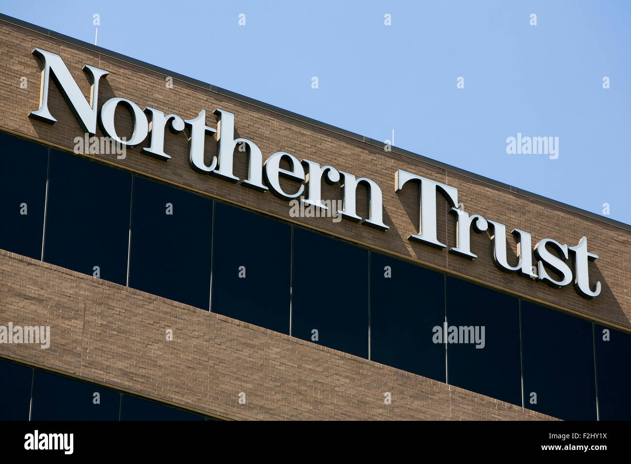 Un segno del logo al di fuori di una struttura occupata dalla Northern Trust Corporation di Addison, Texas, il 12 settembre 2015. Foto Stock