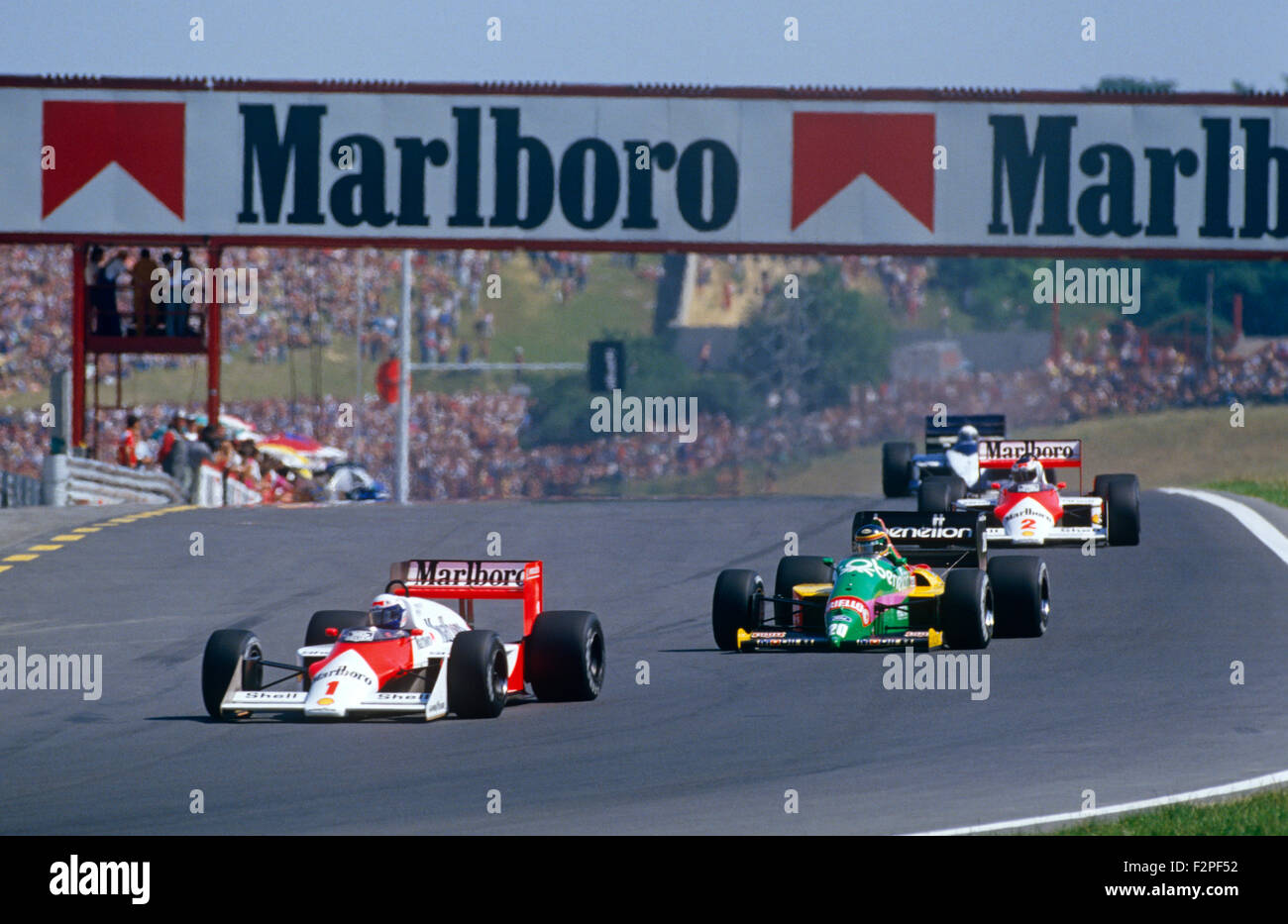 Alain Prost in una McLaren Porsche, Thierry Boutsen in Benetton Cosworth e Stefan Johansson in una McLaren TAG Porsche 1987 Foto Stock