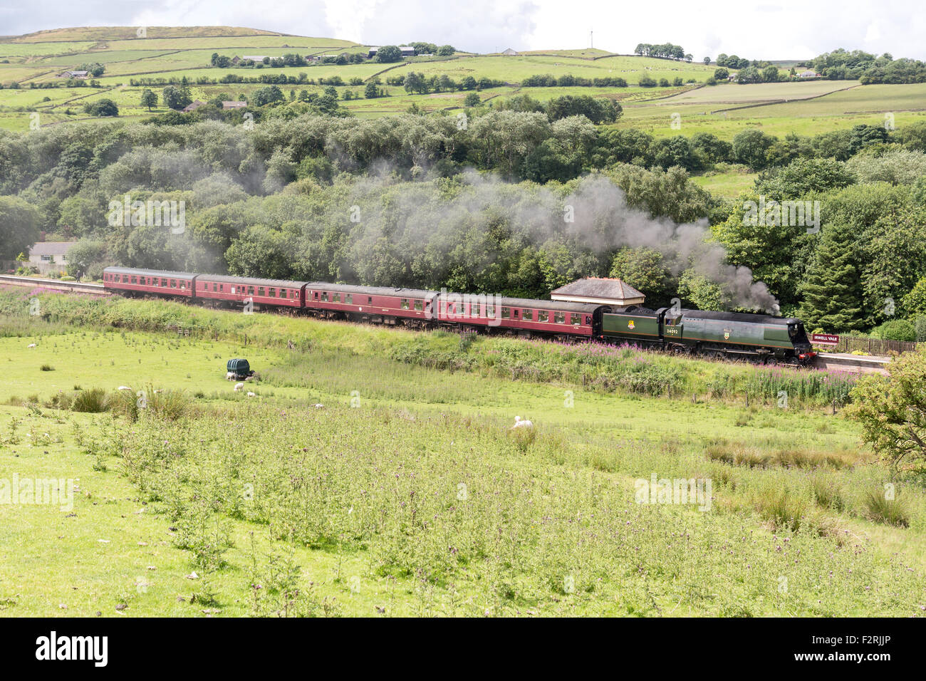 Conservato il treno a vapore sulla East Lancs ferroviarie, a Irwell Vale, vicino a Bury in Lancashire Foto Stock