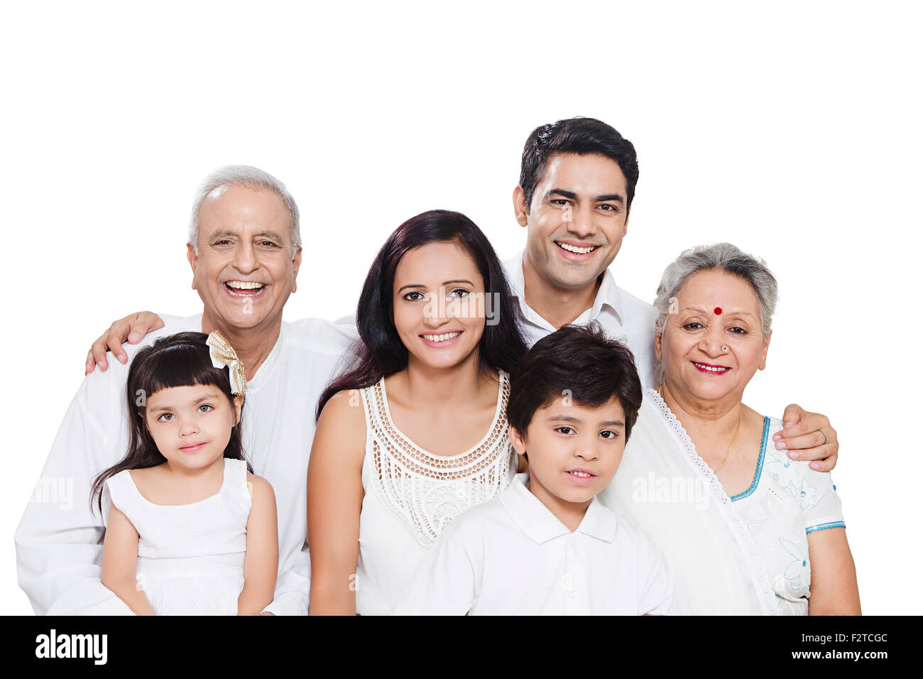 Gruppo indiano Joint famiglia godono di seduta Foto Stock