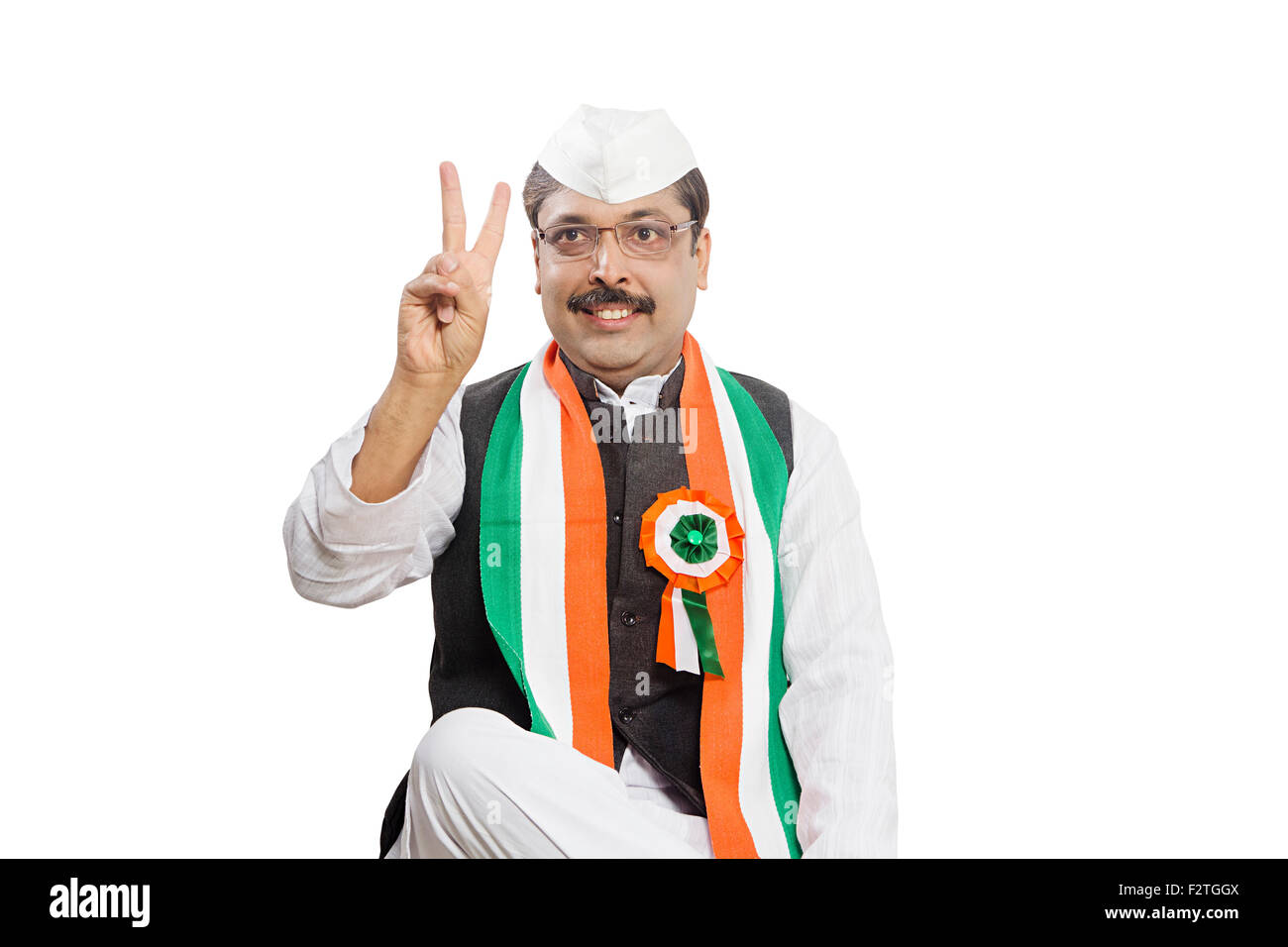 1 indian Adulto Uomo politico dito che mostra la vittoria Foto Stock