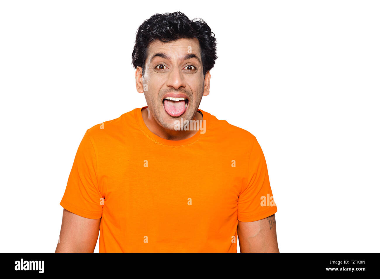 1 indian uomo adulto che mostra la linguetta Teasing Foto Stock