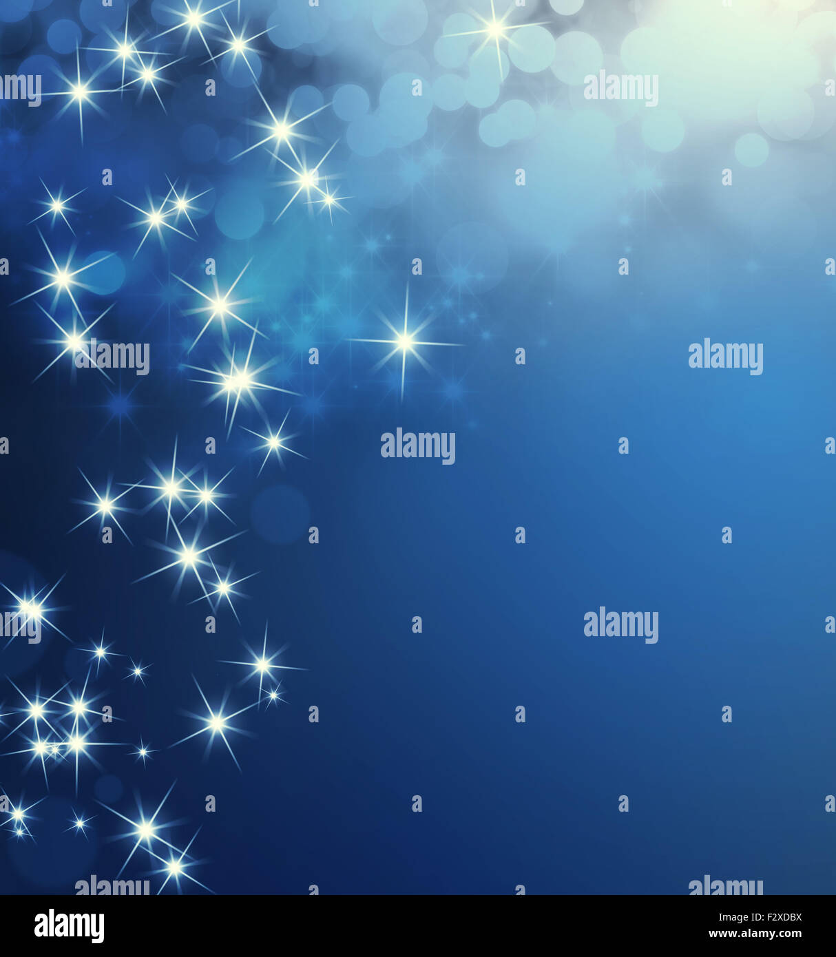 Shiny sfondo blu con le luci a stella piovono Foto Stock
