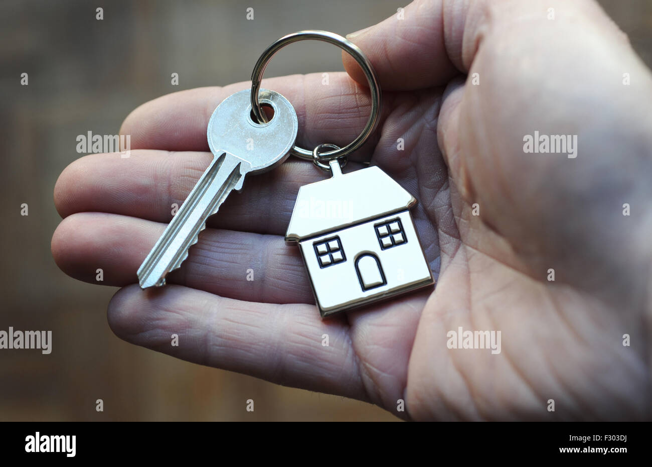 Man mano azienda CHIAVE DI CASA E FOB RI casa acquirenti acquisto scaletta alloggiamento mercato immobiliare ipoteche proprietari Tariffe proprietà REGNO UNITO Foto Stock