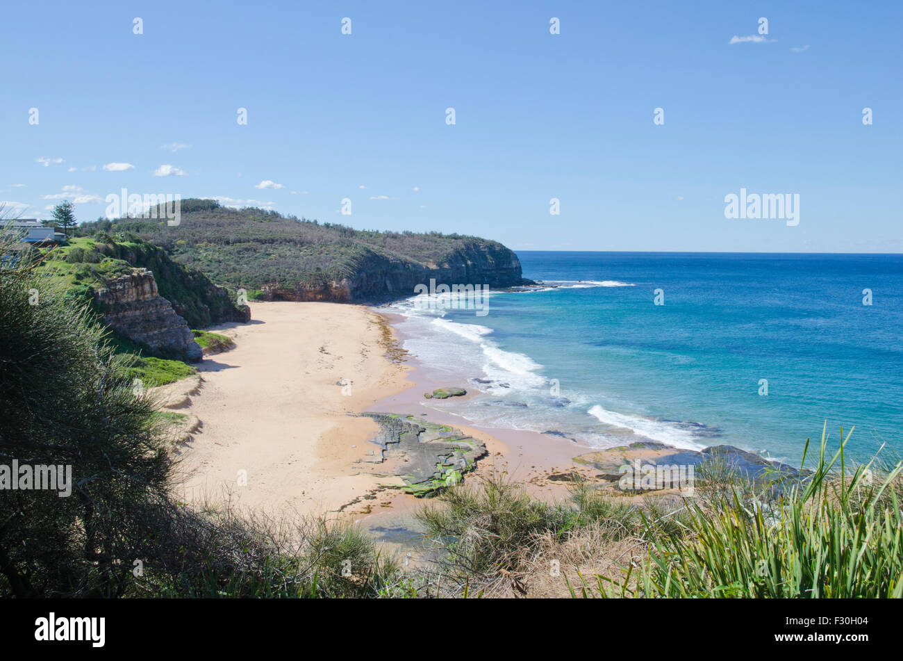 Turimetta Beach,Sydney sobborgo di Warriewood NSW Australia.un pericoloso spiaggia per nuotare - forti correnti e rocce sommerse Foto Stock