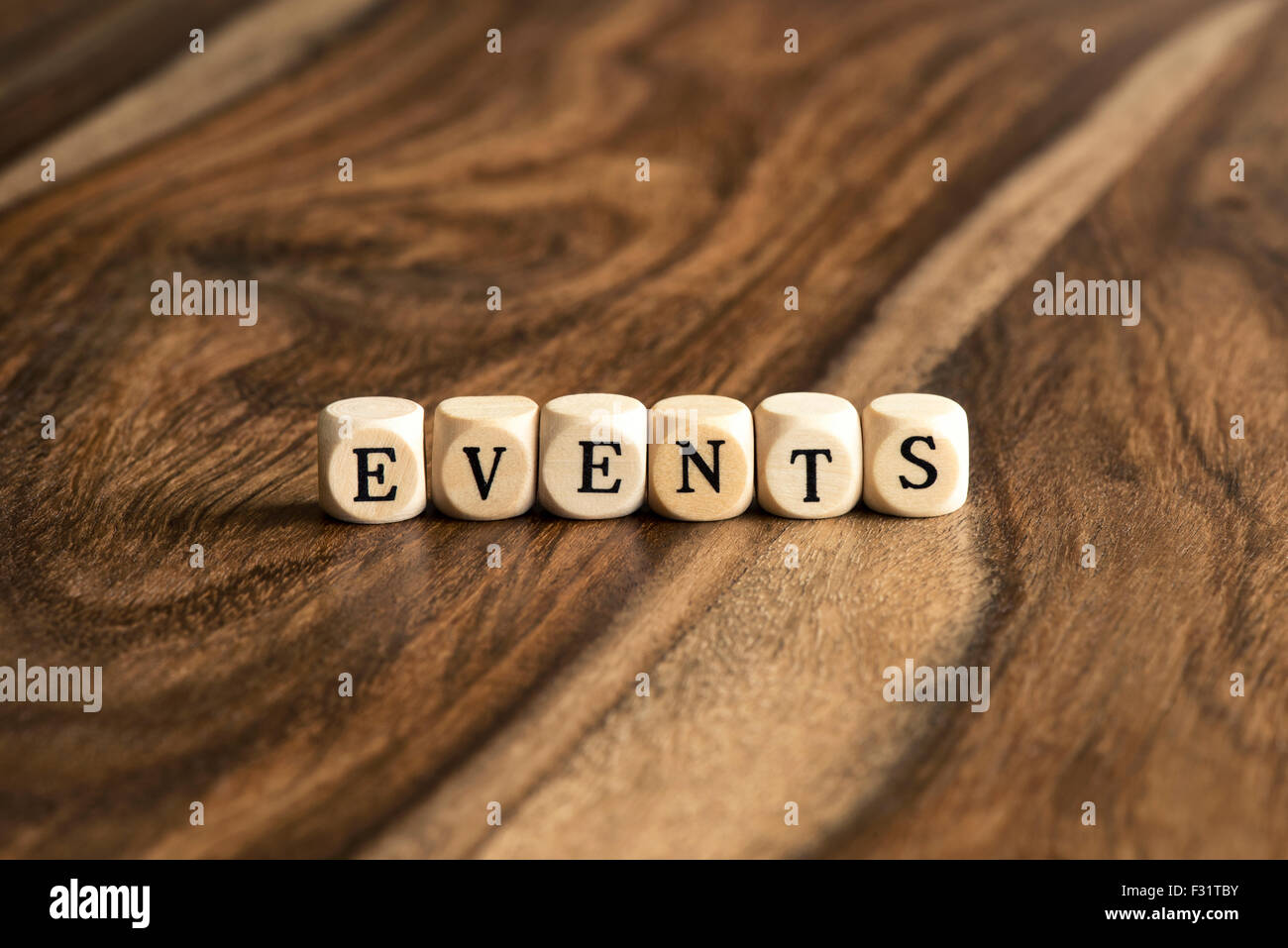 Eventi parola sfondo su blocchi di legno Foto Stock