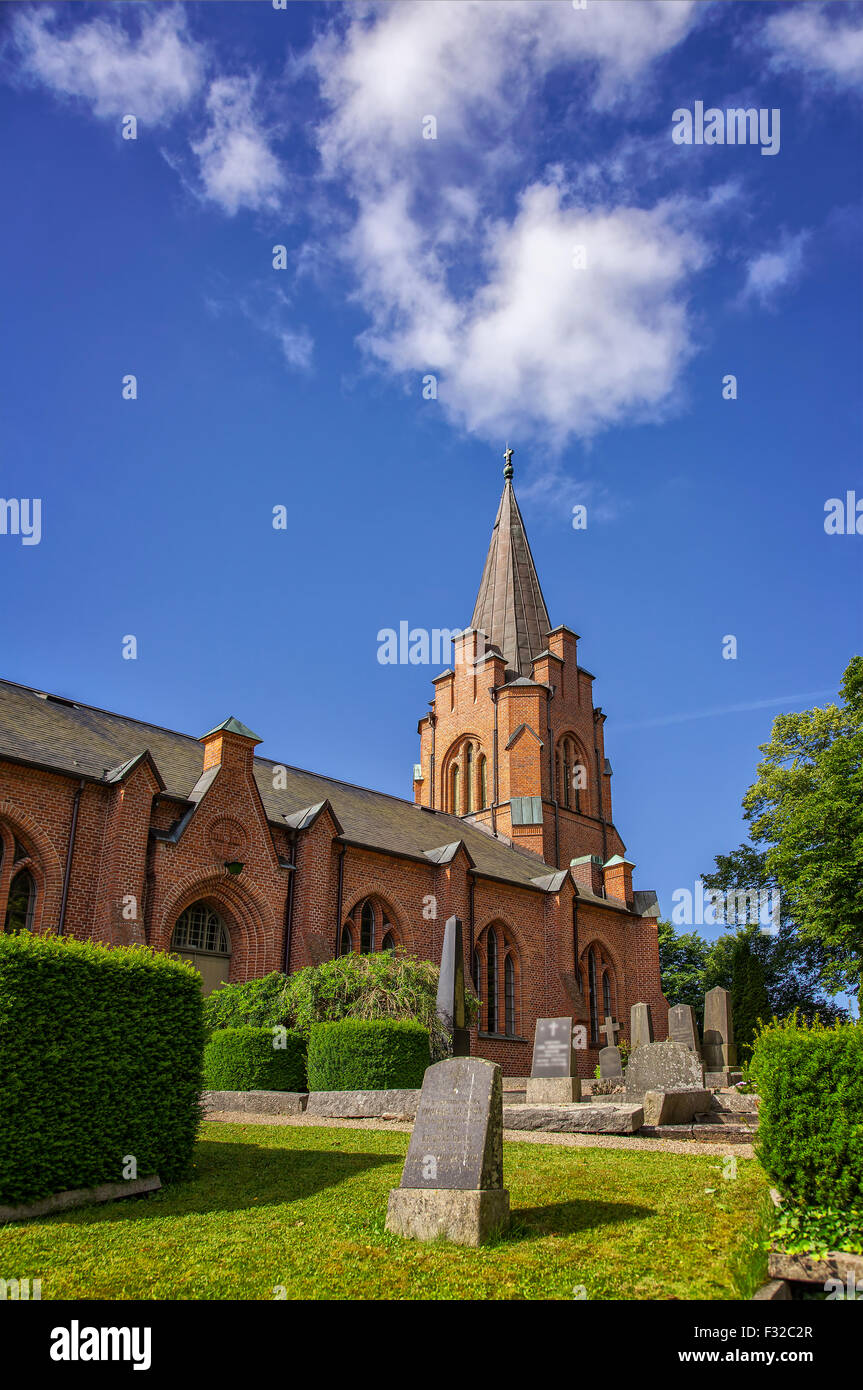 Immagine di un tipico mattone rosso chiesa in Svezia. Billinge, Skane. Foto Stock