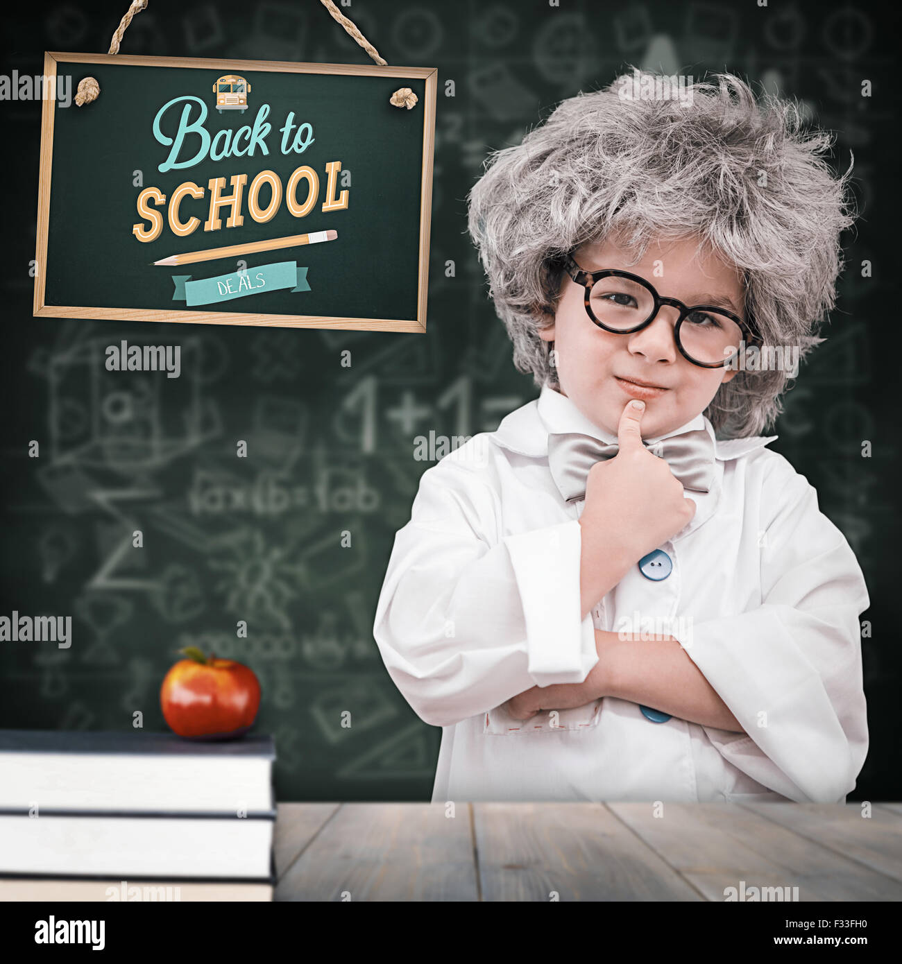 Immagine composita della pupilla carino in camice Foto Stock