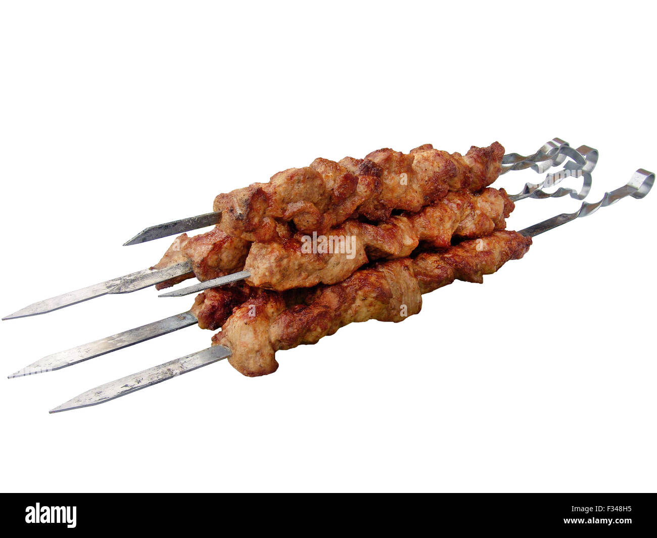 Il shish kebab spiedini su isolati su sfondo bianco Foto Stock