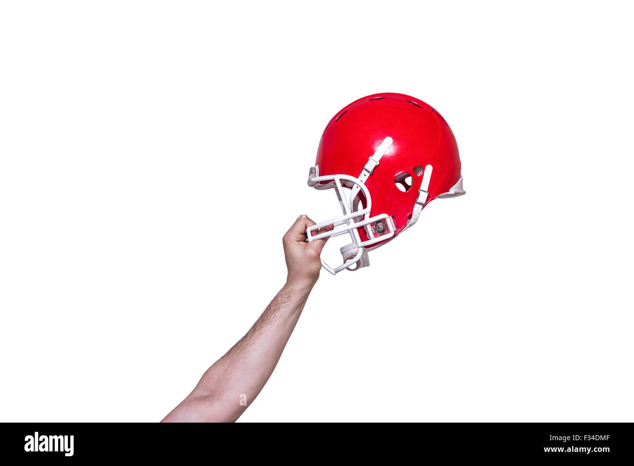 Giocatore di football americano di consegnare il suo casco Foto Stock