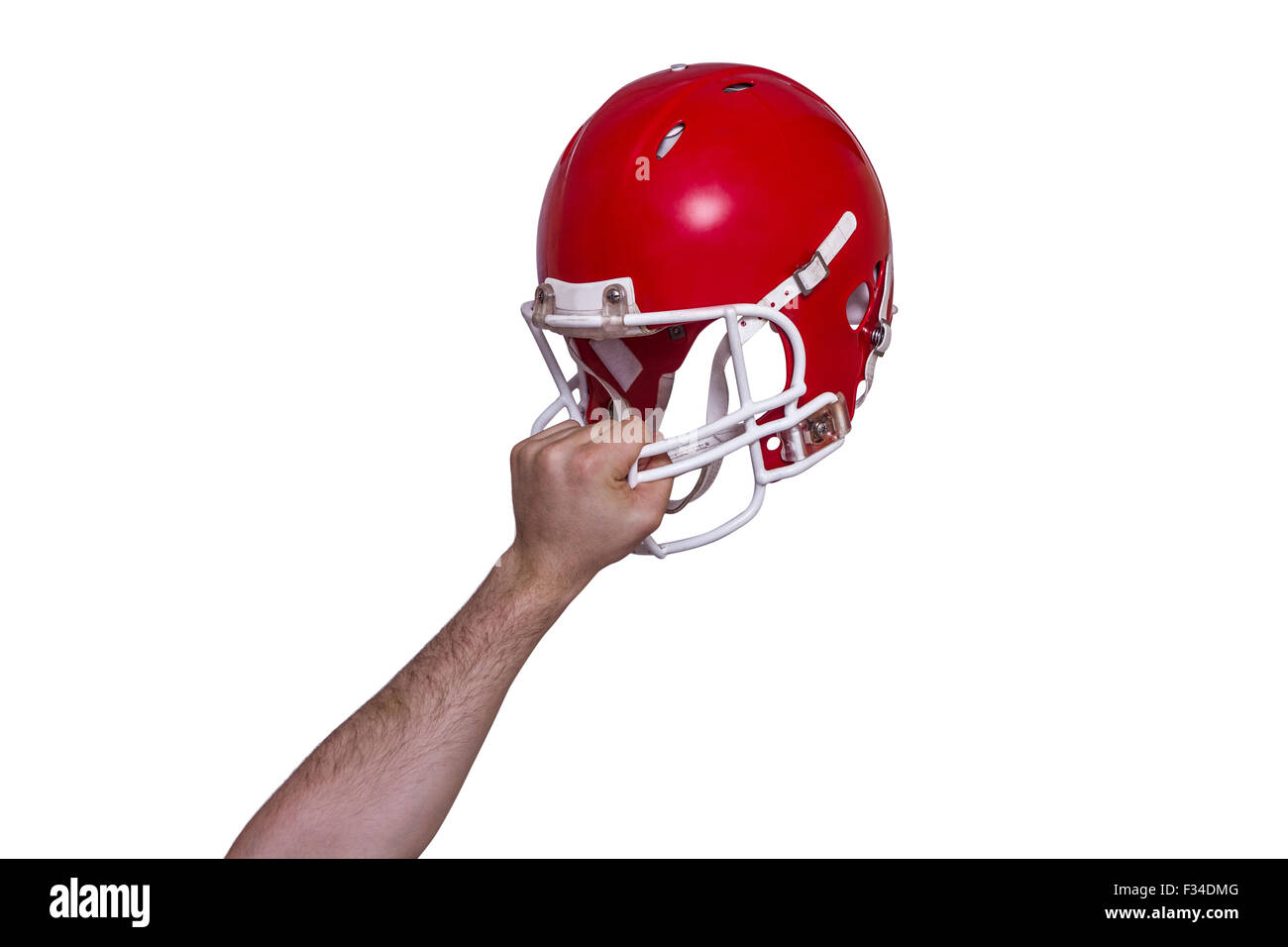 Giocatore di football americano di consegnare il suo casco Foto Stock