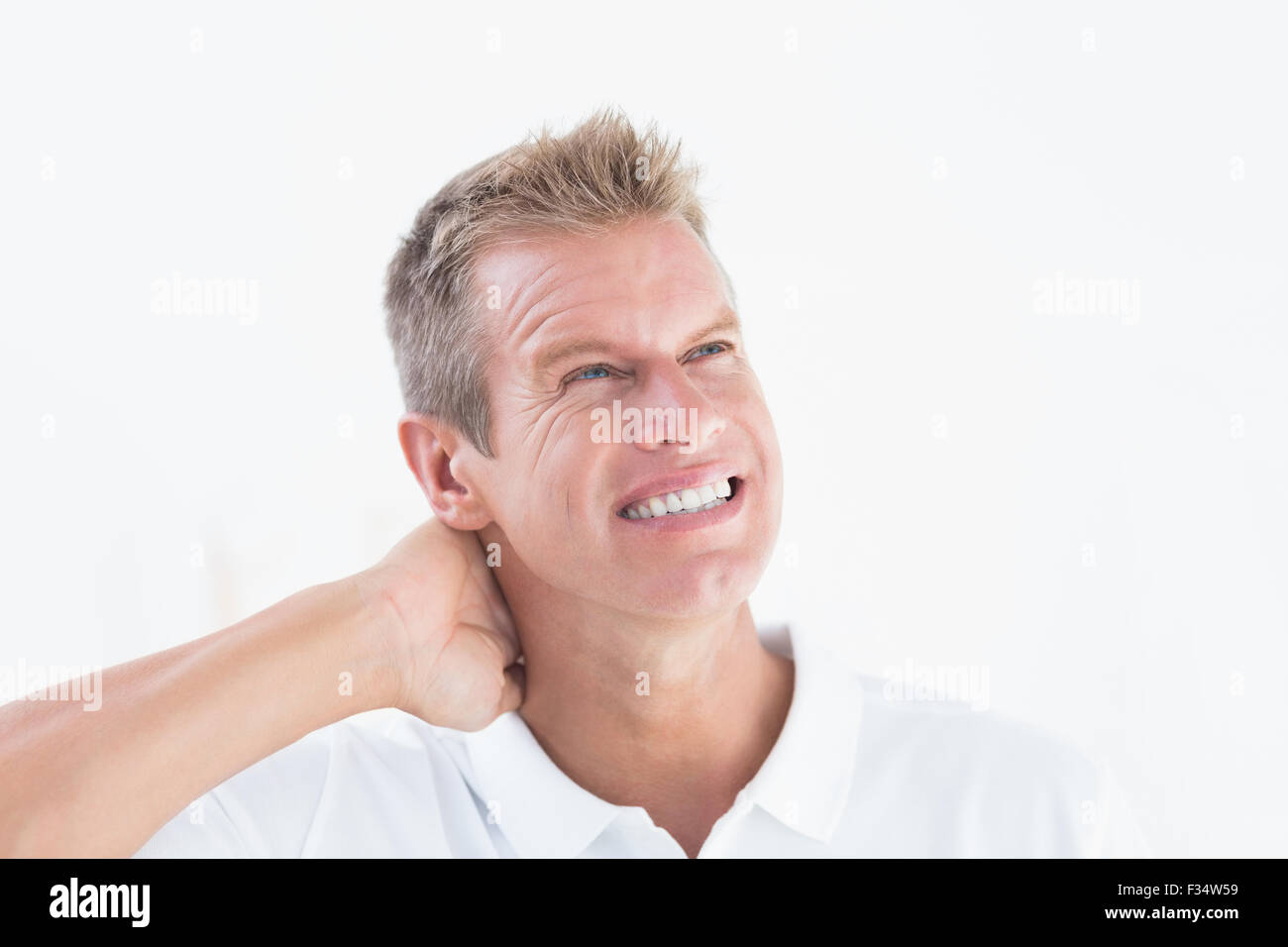 Un medico con un grande mal di testa Foto Stock