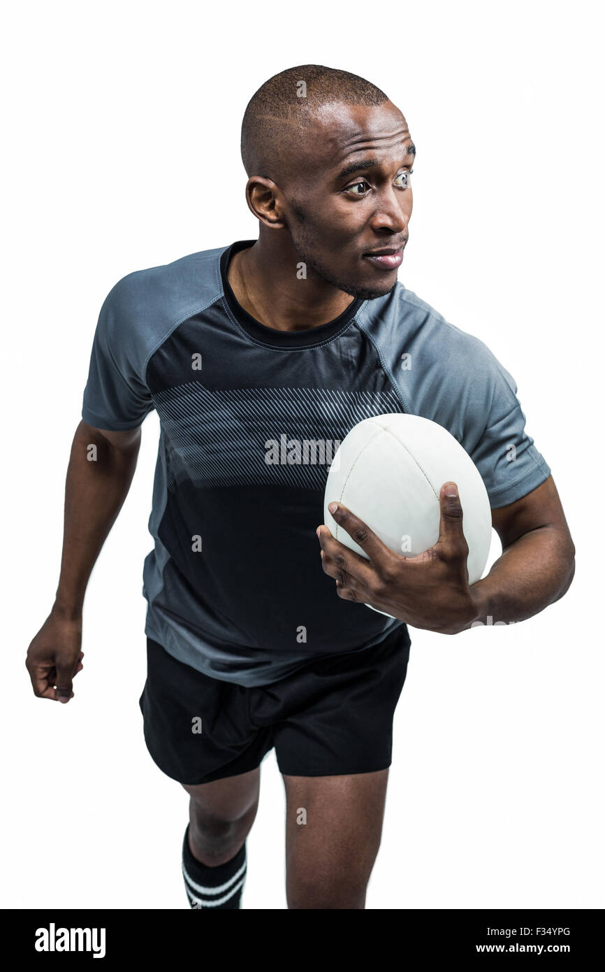 Fiducioso atleta con palla da rugby Foto Stock