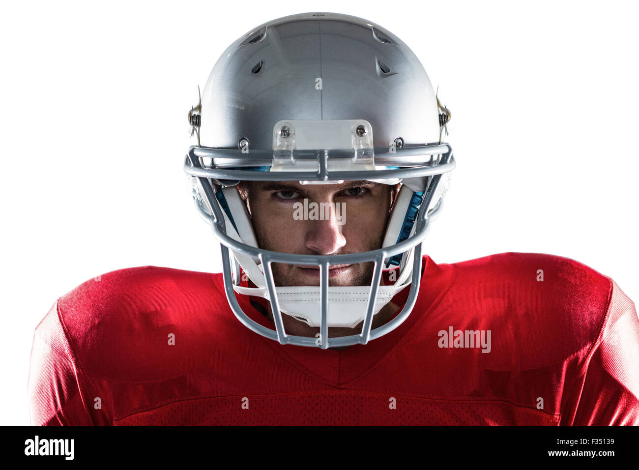 Primo piano ritratto del calciatore americano in attrezzature sportive,  casco e guanti isolati su sfondo bianco studio. Concetto di sport Foto  stock - Alamy