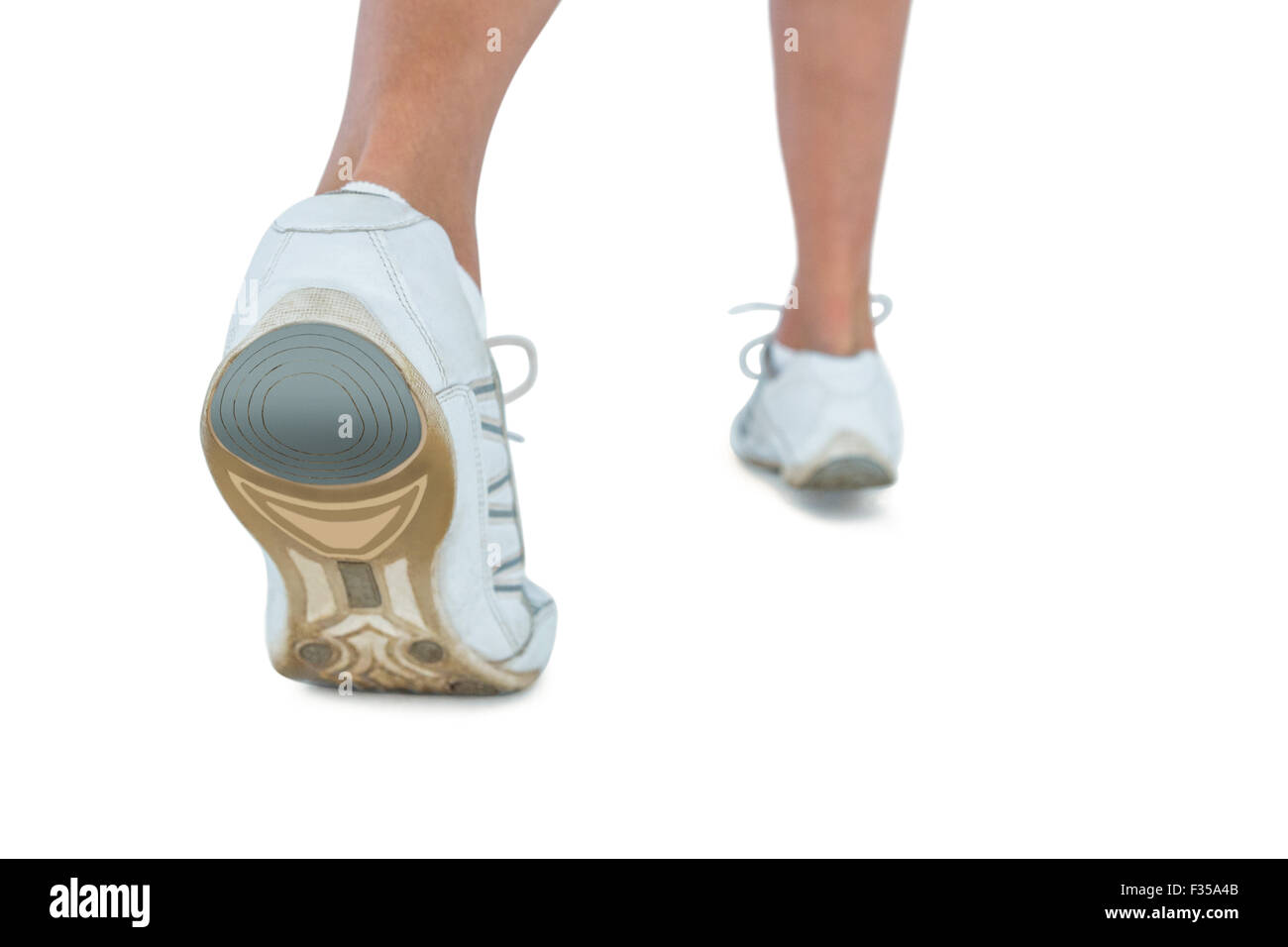 Sezione bassa della donna che indossa scarpe sportive jogging Foto Stock