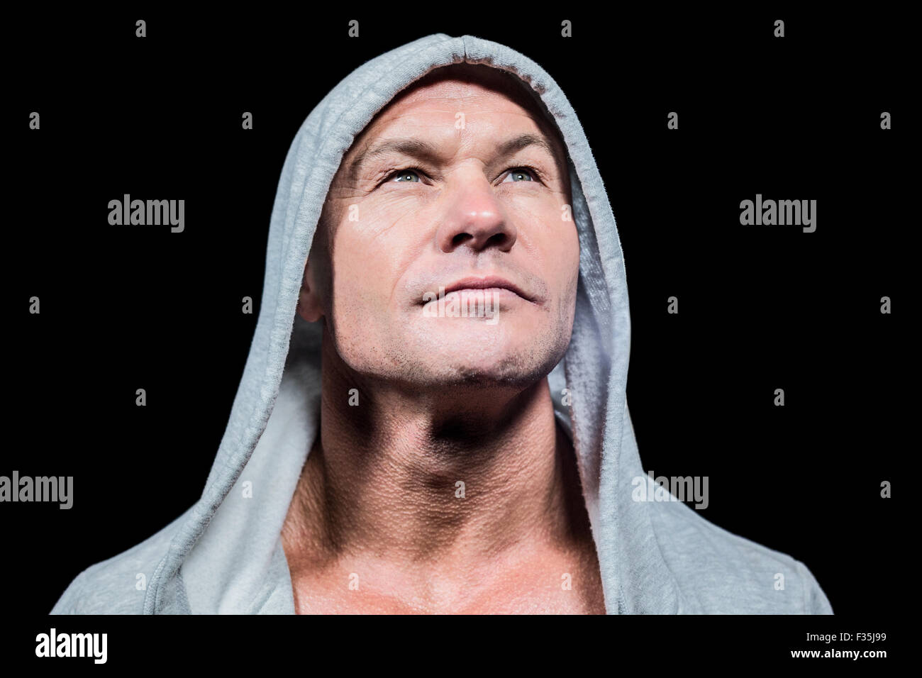 Atleta in cerca del cofano fino Foto Stock