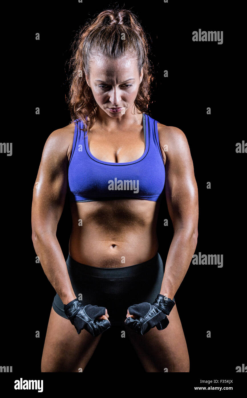 Combattente donna muscoli di flessione Foto Stock