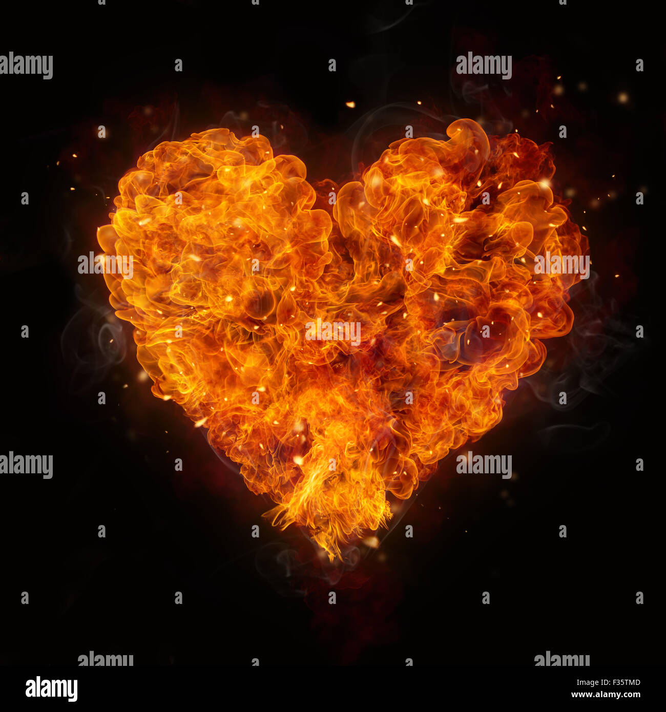 Calde fiamme incendi in forma di cuore Foto Stock