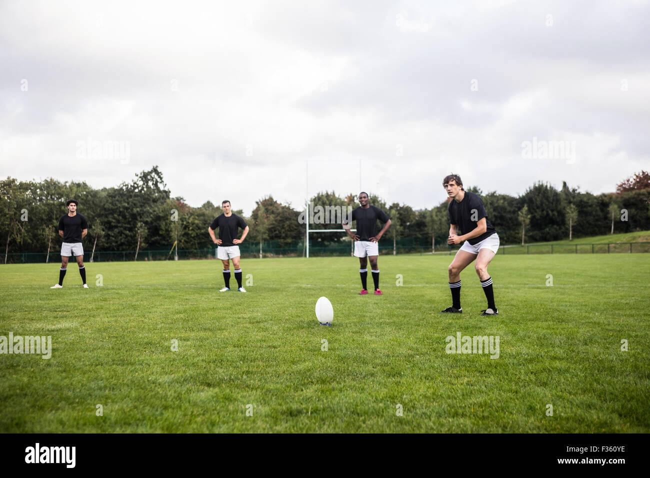 Giocatori di Rugby la formazione del passo Foto Stock