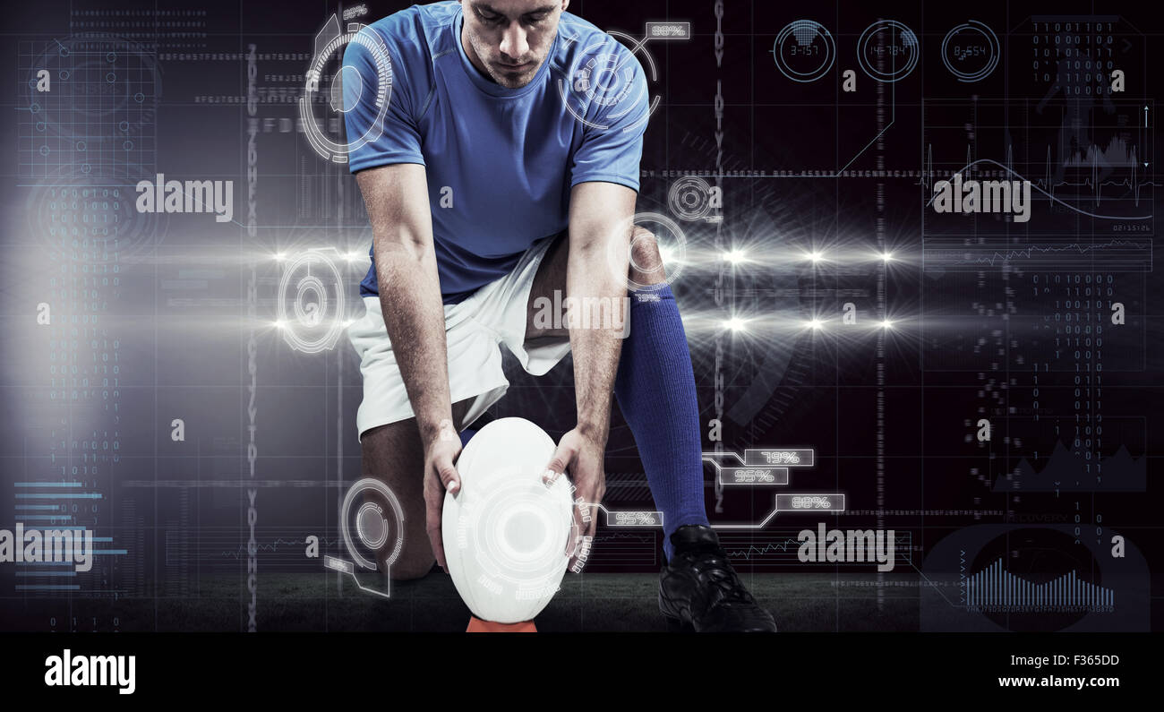 Immagine composita di lunghezza completa di giocatore di rugby mettendo la sfera Foto Stock