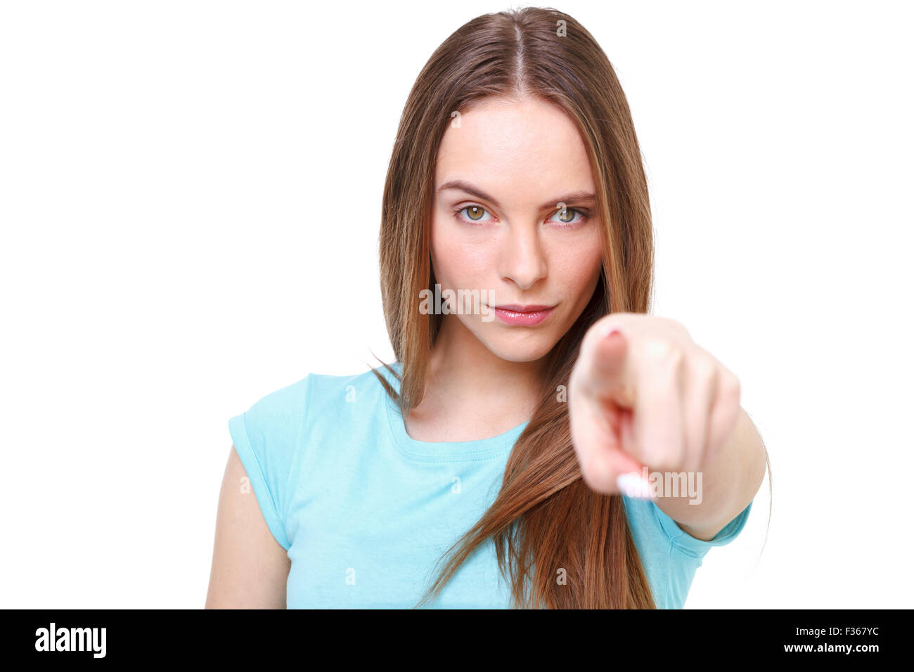 Ragazza giovane rivolto a voi - isolato su sfondo bianco. Foto Stock