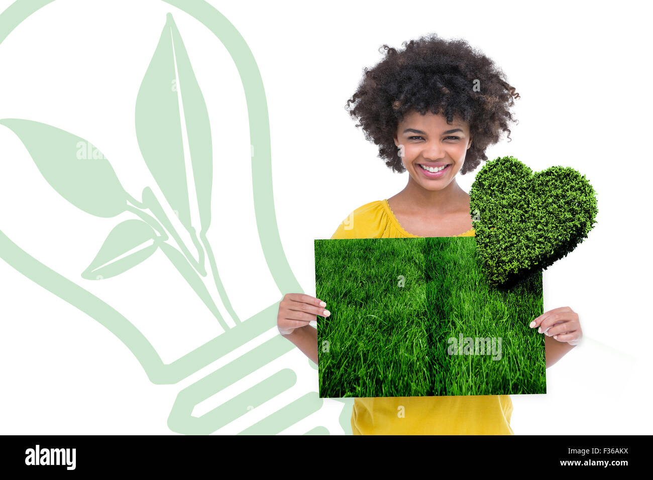 Immagine composita della donna azienda prato prenota Foto Stock